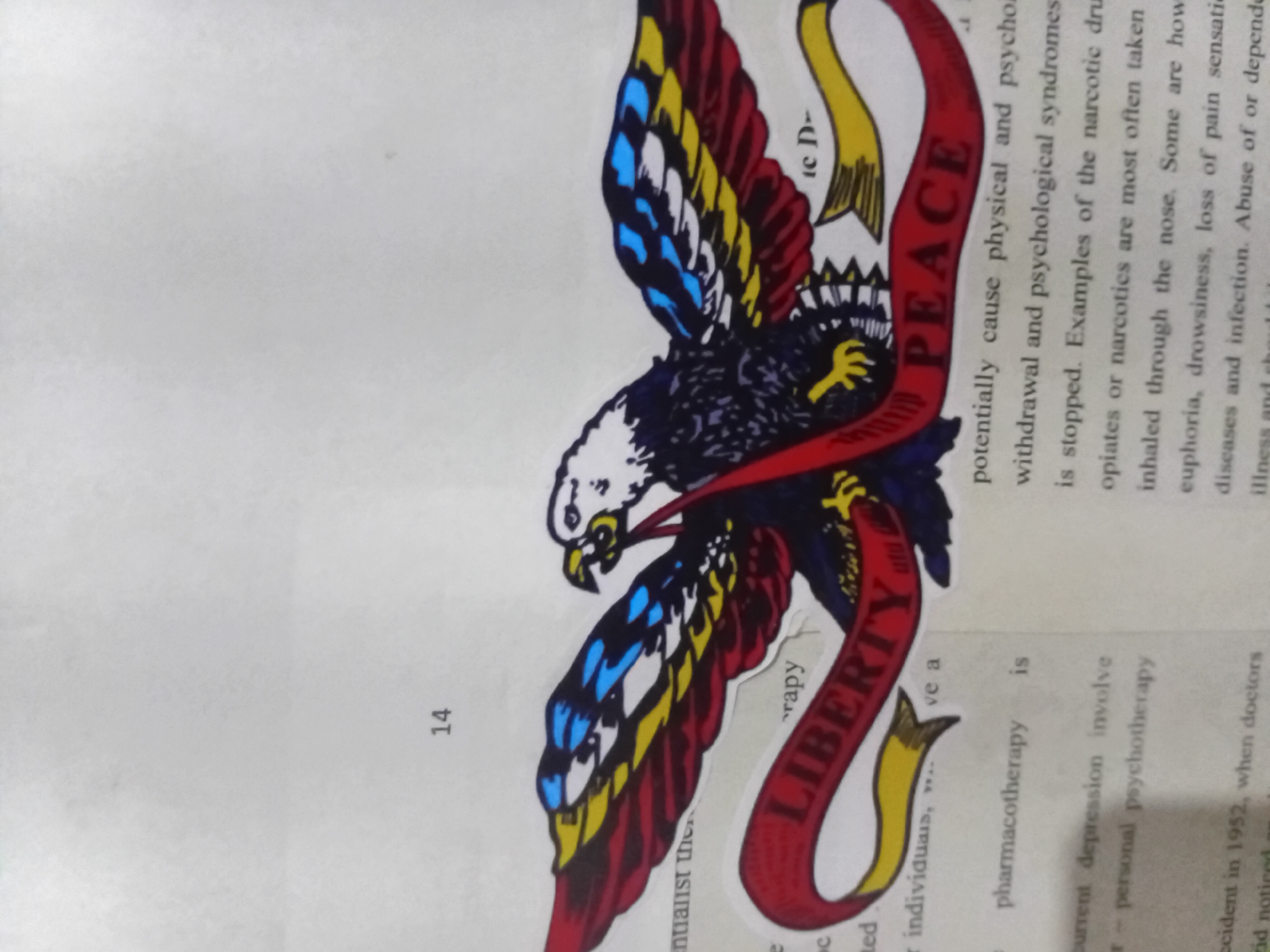 The image shows a sticker of an eagle with wings made of red, yellow, and blue stripes. The eagle has a white head and a dark body. A red banner wraps around the eagle with the words "LIBERTY" and "PEACE" written on it. The sticker is placed on a page of text, which includes words like "pharmacotherapy," "personal psychotherapy," "withdrawal," and "narcotics." The number "14" is visible on the left side of the page.