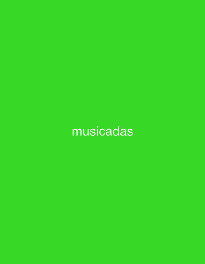 The image displays a solid, vibrant green background. Centered horizontally and slightly above the vertical midpoint, the word "musicadas" is written in white, sans-serif, lowercase letters. There are no other visible subjects, objects, people, or discernible scenes or activities within the image. The background is uniformly colored, showing no textures or patterns. The overall impression is minimalist, focusing solely on the text against the green field. The provided context indicates a location of Santa Ana, Venezuela, although no visual cues in the image itself suggest this specific geographical setting.