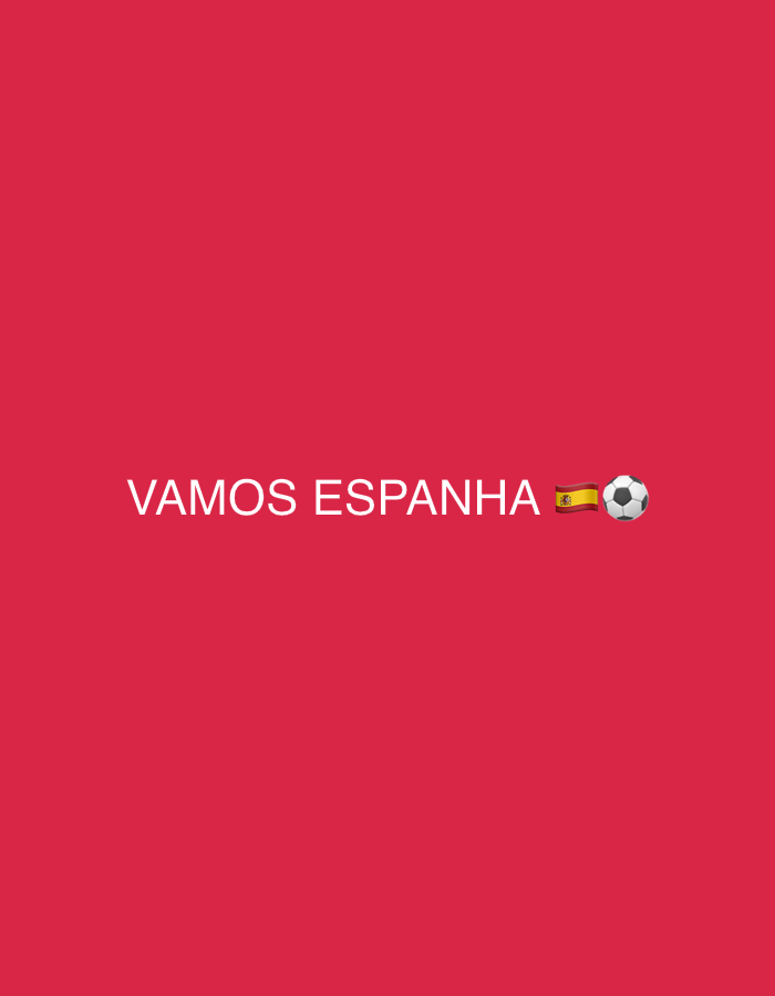 The image displays the text "VAMOS ESPANHA" in white, bold, sans-serif font against a solid red background. To the right of the text, there are two emojis: the flag of Spain and a soccer ball. The scene is a simple graphic with no discernible urban or environmental context, and therefore cannot be associated with a specific location in Esch-sur-Alzette or any other city. There are no people, actions, or interactions depicted.