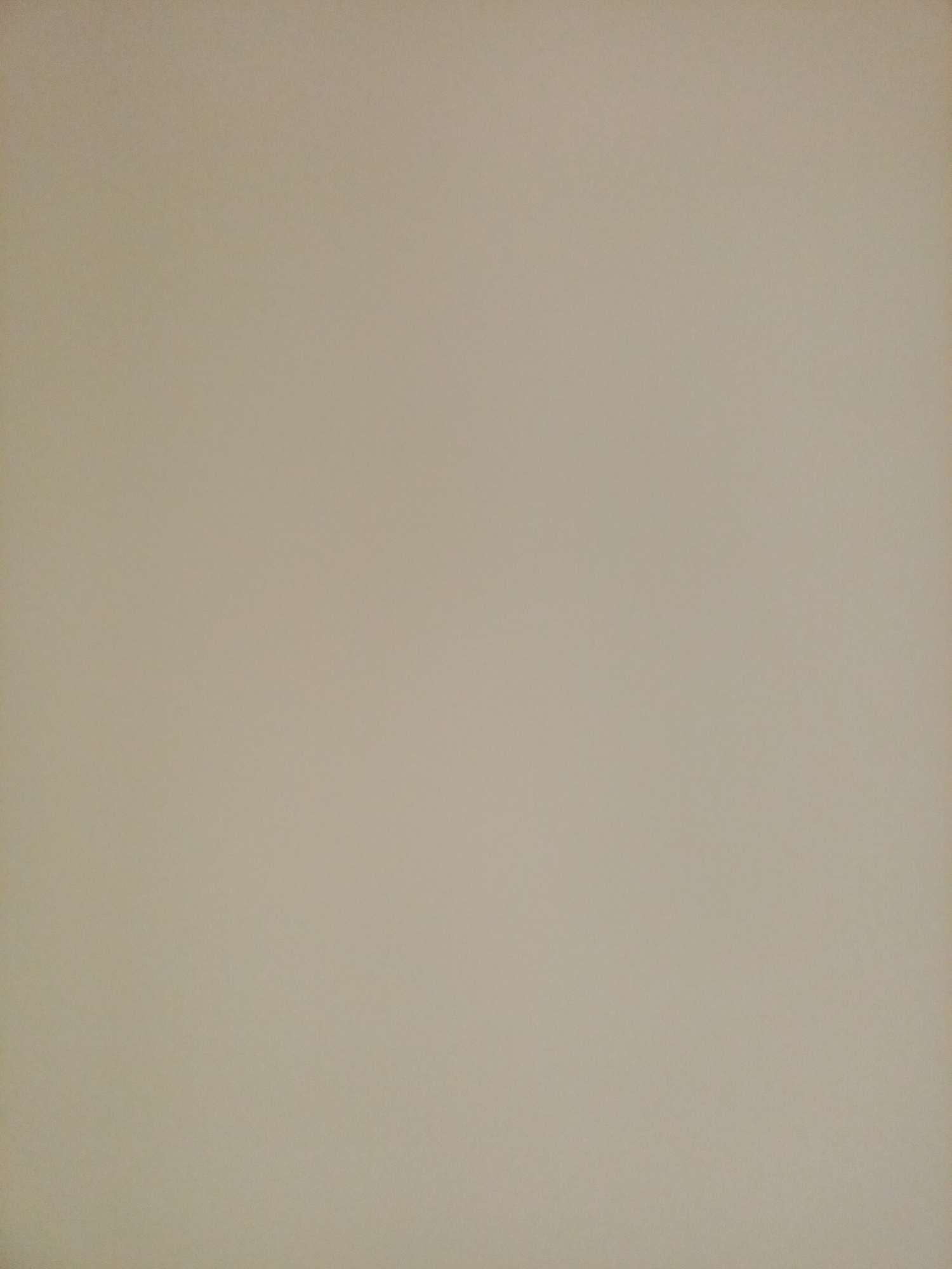 The image is a plain, textured surface, appearing to be a wall or a backdrop. The color is a neutral, light beige or tan. There are no discernible objects, people, or any environmental features visible. The image lacks any details that would allow for identification of a specific location, including Rostov-on-Don, Russia.