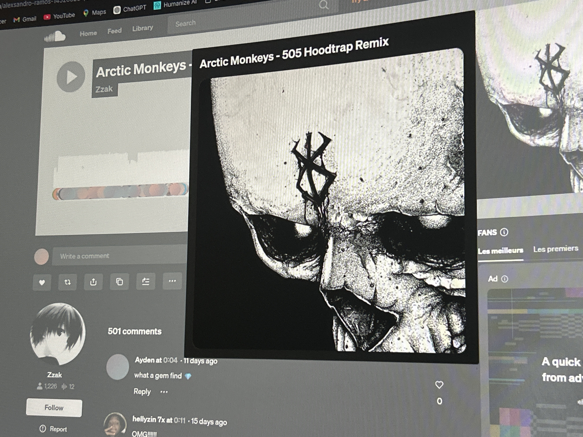 The image shows a screen capture of a desktop computer displaying a SoundCloud page featuring a remix of the song "505" by the band Arctic Monkeys. The remix is labeled "505 Hoodtrap Remix" and uploaded by user "Zzak." The album art displays a skull with a prominent rune or symbol on its forehead. Beneath the album art, there is a comment section. The user "Ayden" commented "what a gem find" 11 days ago. Other apps or tabs visible in the upper portion of the screen include Gmail, YouTube, Maps, and ChatGPT. The environment indicates a home or office setting with a computer setup.