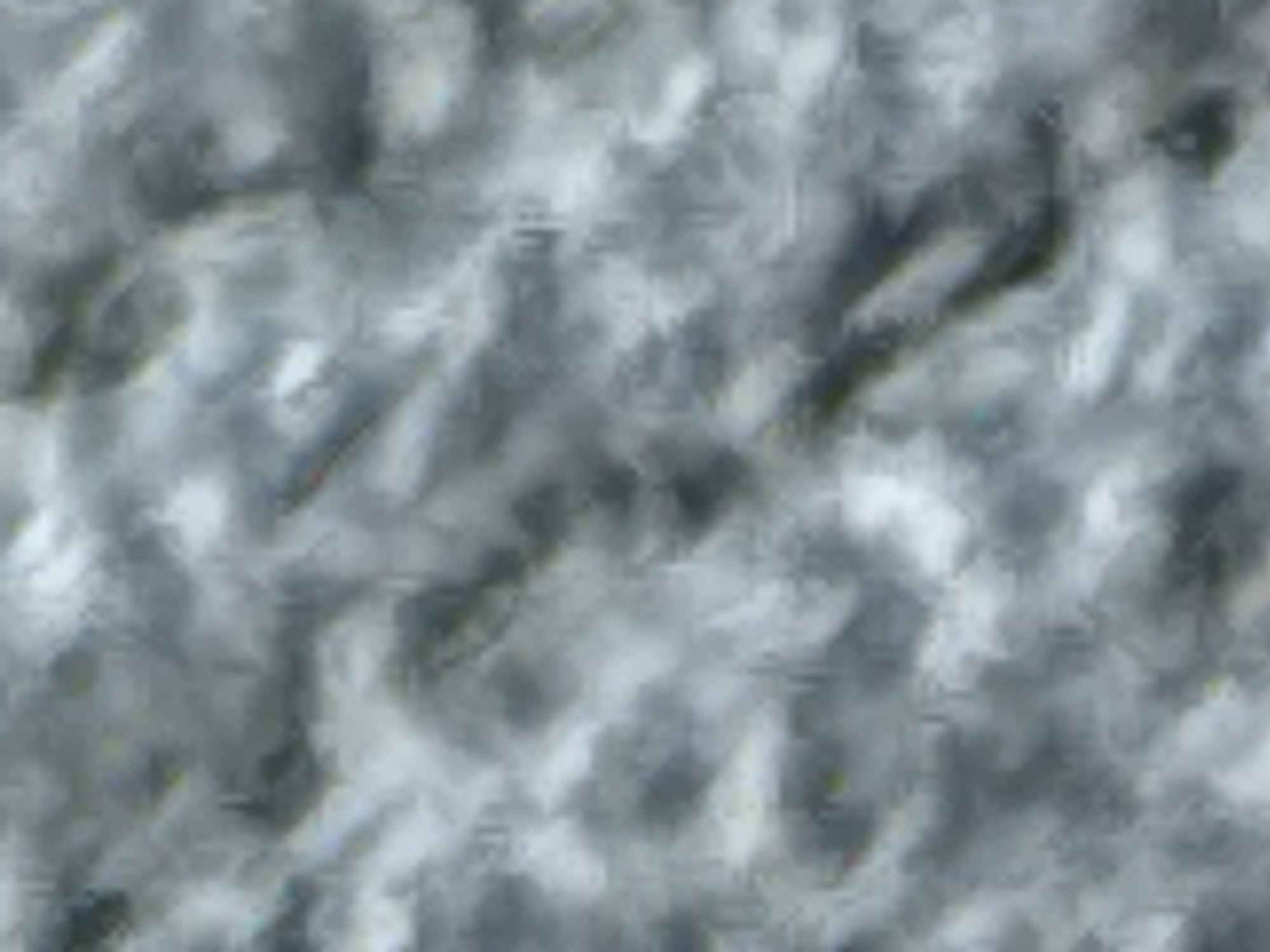 The image depicts an abstract, textured surface with varying shades of grey, white, and some dark, indistinct patches. The texture appears to be uneven and somewhat organic, with visible brushstrokes or a similar application technique. There are no discernible people, subjects, or objects that could be identified as being in Varna, Bulgaria. The scene is entirely abstract and lacks any contextual clues that would place it in a specific geographical location.
