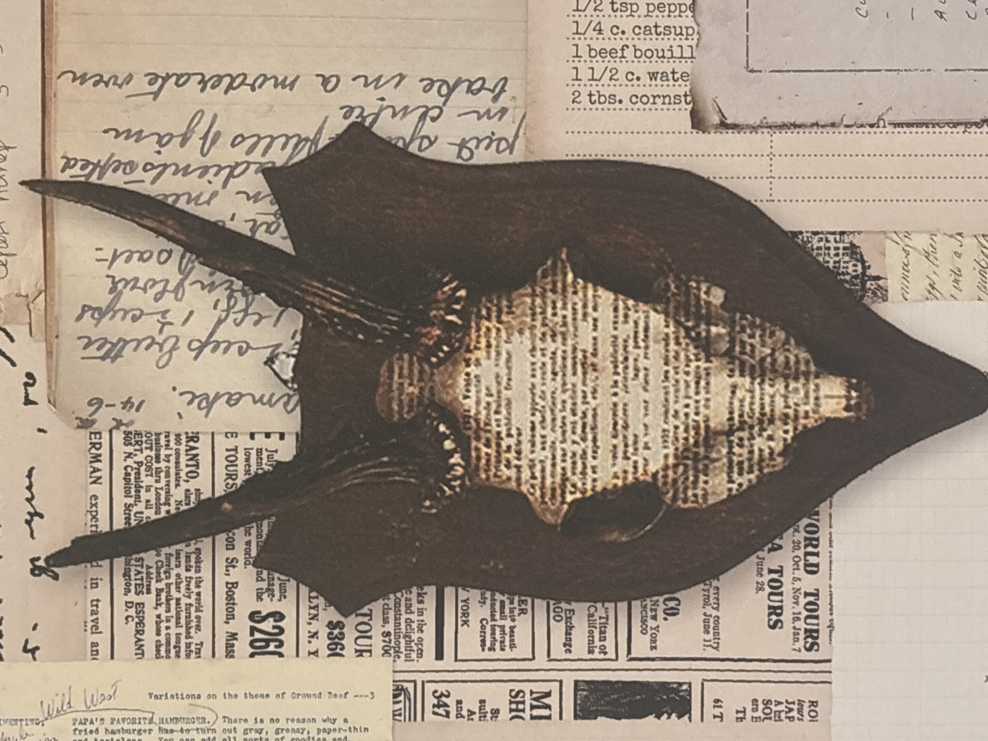 The image is a collage featuring a mounted deer skull on a backdrop of various printed materials. The skull is centrally positioned, with its antlers extending upwards and outwards. The bone appears to be overlaid with text. Below the skull is a collage of snippets from advertisements, recipes, and handwritten notes. One ad mentions "WORLD TOURS", listing dates and destinations. Another snippet includes the phrase "PAPA'S FAVORITE HAMBURGER" and a partial recipe. A handwritten note describes ingredients and baking instructions. The collage evokes a sense of vintage ephemera and rustic taxidermy. The locations mentioned in the collage include New York, Boston, and Washington D.C.