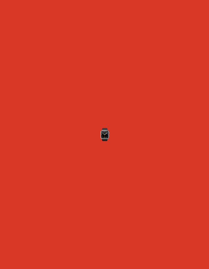 The image is a close-up of a single, black smartwatch with a square face, positioned in the center of a vibrant, solid red background. The smartwatch is oriented such that its screen is facing the viewer. There are no other objects or people visible in the frame. The background is a uniform, deep red color, with no discernible texture or pattern. The lighting is even, with no harsh shadows cast by the watch. The overall impression is one of simplicity and focus on the single object. There is no information available in the image to suggest a location in Moscow, Russia.