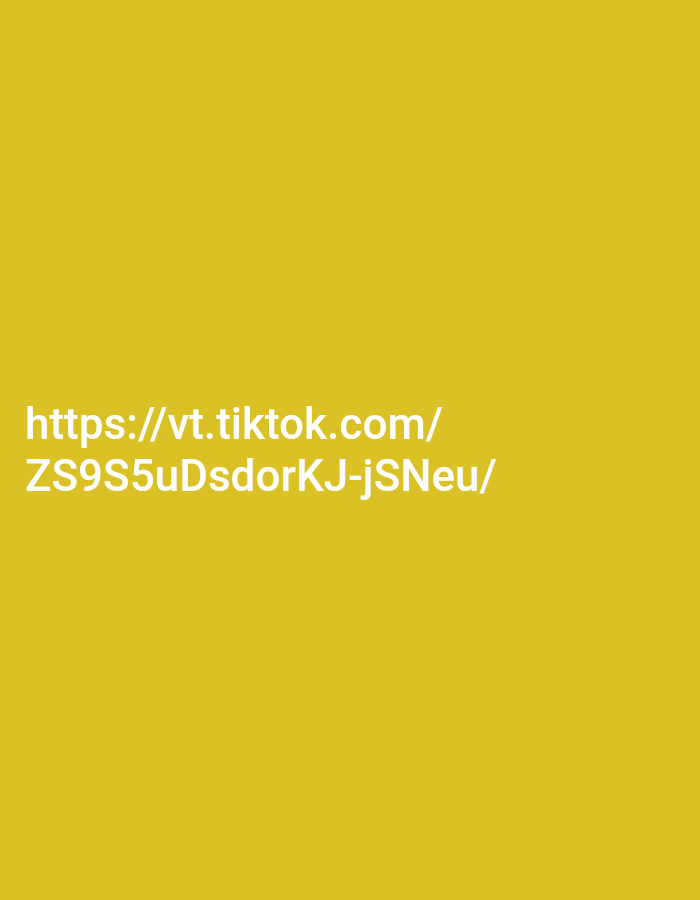This image is a plain yellow background with white text. The text reads "https://vt.tiktok.com/" and on the line below it, "ZS9S5uDsdorKJ-jSNeu/". There are no people, objects, actions, or interactions visible in the image. The location in the city of Kendayakan, Indonesia is not depicted or implied in any way.