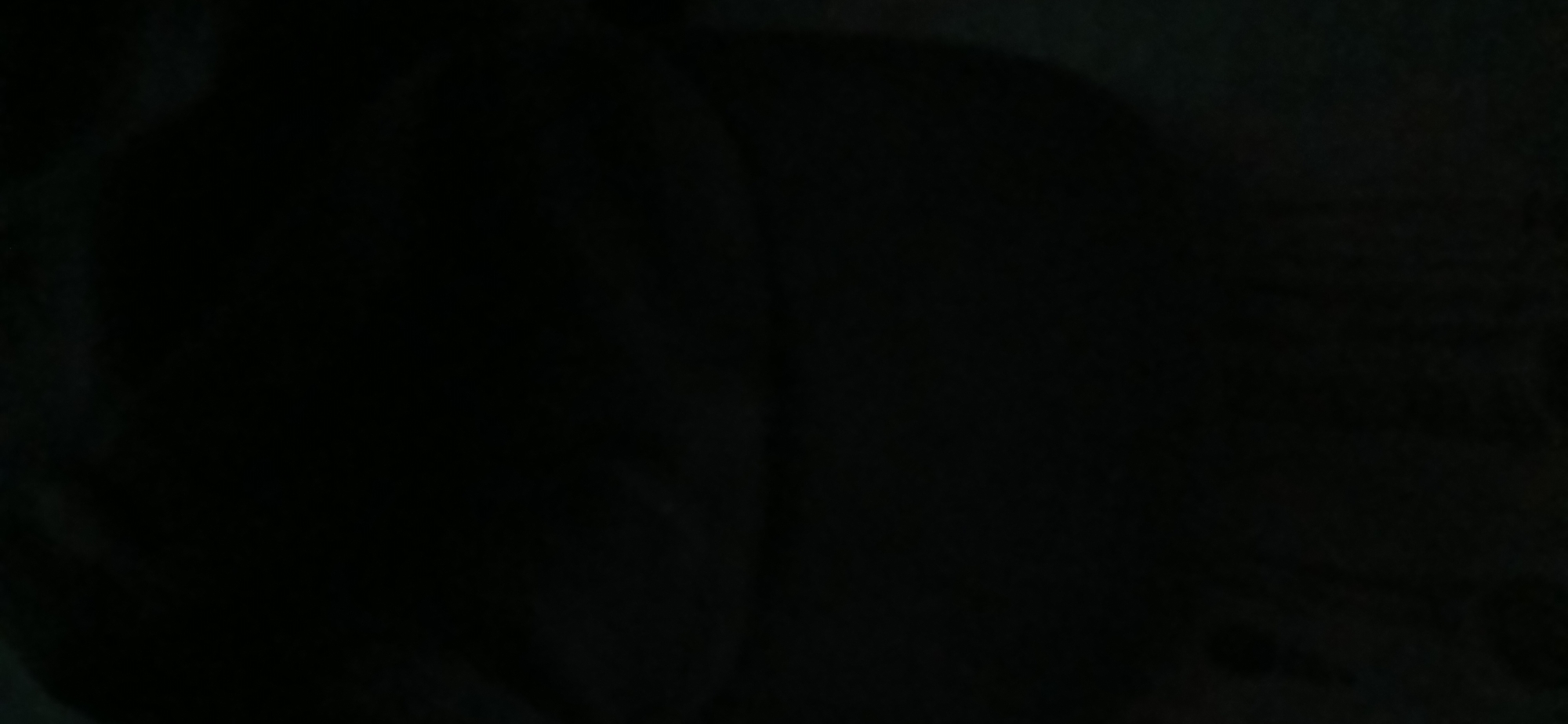 The image is dark and blurry, making it difficult to discern any specific details about the location or subjects. The overall impression is of a dimly lit environment, possibly indoors or at night, with no clear objects or people identifiable. The crops provided also do not offer any additional clarity. Therefore, it is impossible to provide a detailed, forensic, or matter-of-fact description of the scene, including any details about people, subjects, objects, actions, interactions, or the environment in Kademangan Kulon, Indonesia.