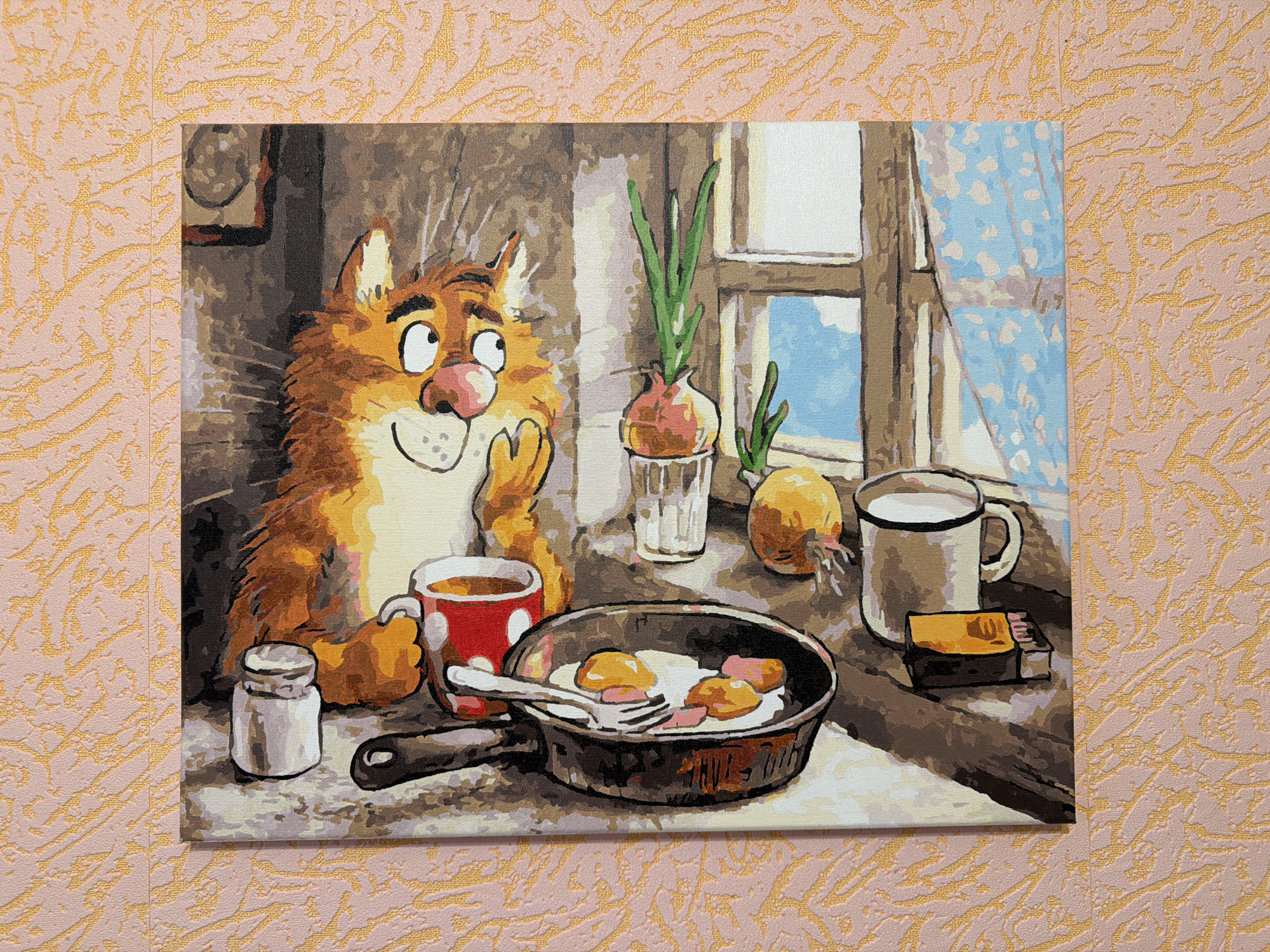 A rectangular painting hangs on a textured, peach-colored wall with golden patterns. The painting depicts a whimsical scene: an anthropomorphic orange cat sits at a table laden with breakfast items. The cat has a thoughtful expression, looking towards the right of the frame with one paw raised to its chin. A red mug with white polka dots sits near the cat, presumably filled with a beverage.
In the center of the table is a frying pan containing fried eggs and pieces of meat, with a fork resting inside. To the left of the pan is a small, white salt shaker. Behind the pan, a glass holding an onion with green shoots emerging from it stands next to another onion lying on the surface. Further to the right, a white mug and a rectangular object, possibly a box of matches, are positioned near a window.
The window is partially visible, showing a view of a blue sky and white clouds through a blue patterned curtain. The background is dimly lit, giving the impression of an indoor setting with natural light filtering in.