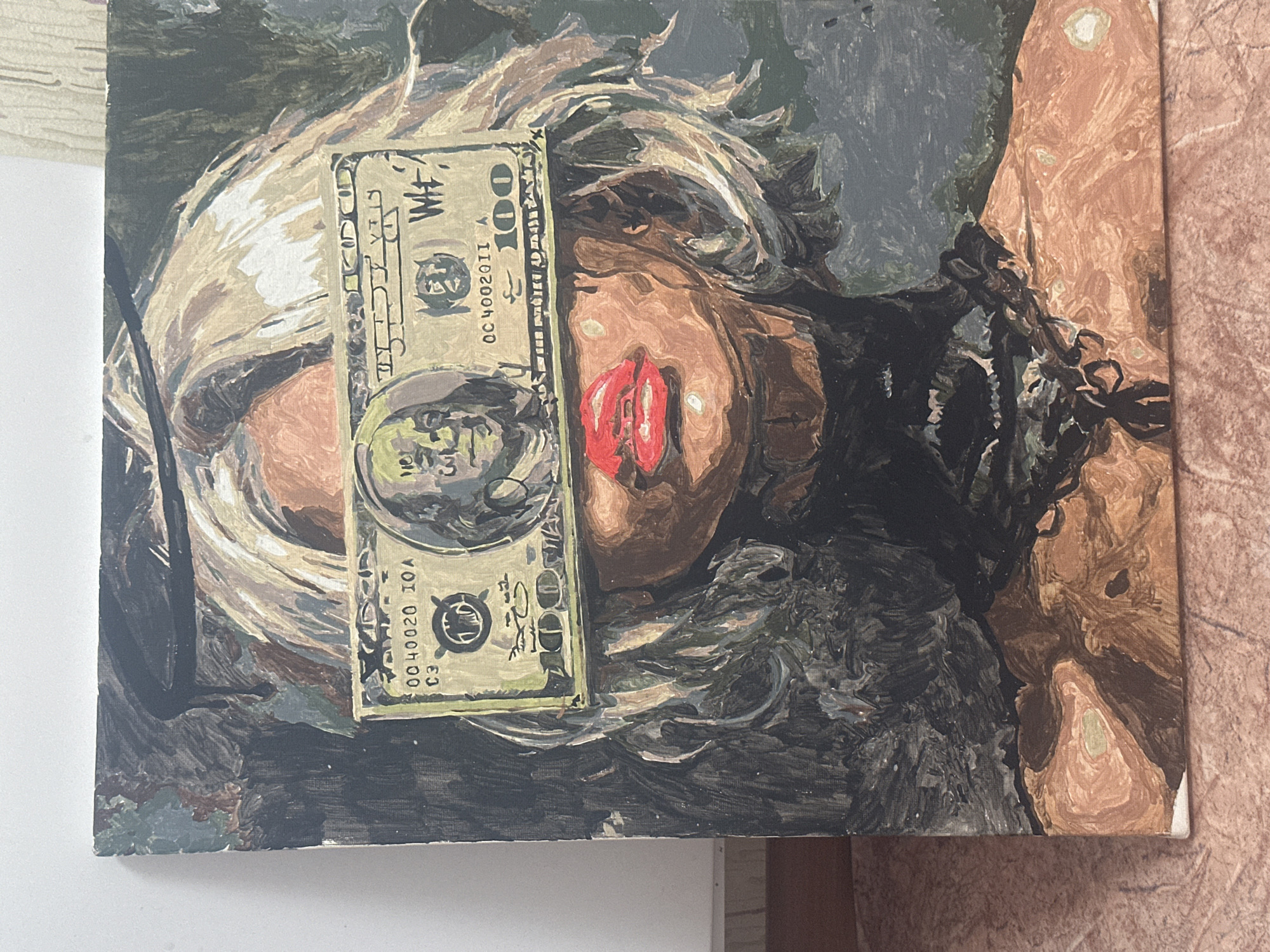 The image depicts a painting. The painting features a face obscured by a blindfold that resembles a turban, across which is placed a depiction of a United States one hundred dollar bill. The individual's face is tilted to the side, with red lips prominently displayed. The surrounding areas appear to be dark and shadowed, with a possible representation of hair or clothing. The painting style is somewhat abstract, with visible brush strokes. The image does not appear to contain any information pertaining to the location in the city of Высокий, Russia.
