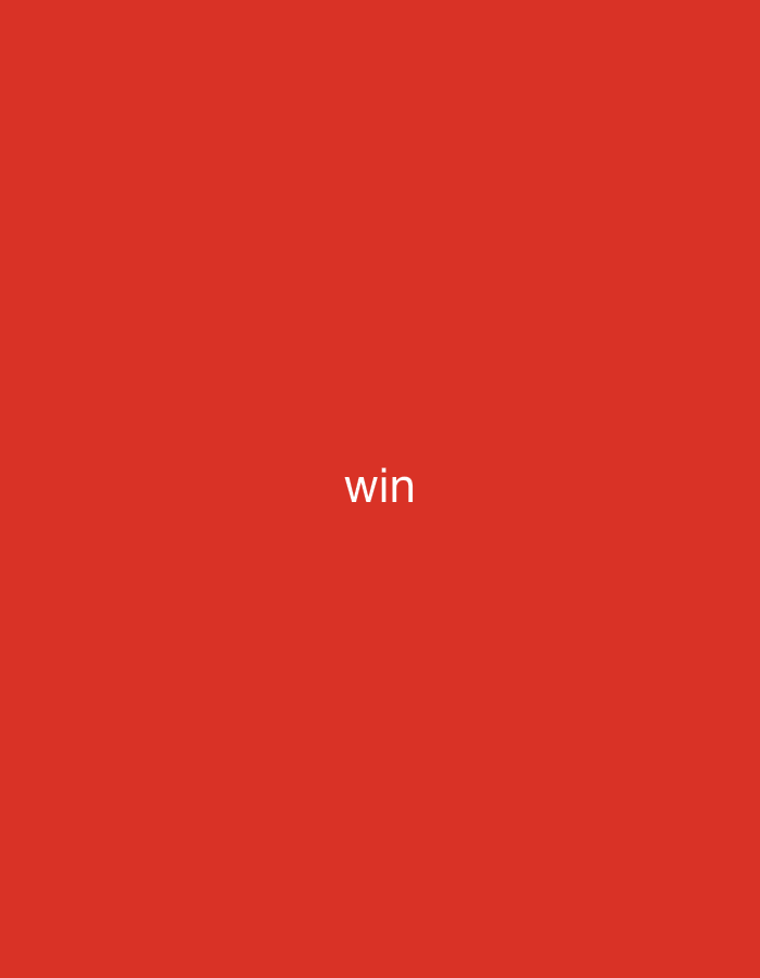 The scene, set in the city of Casablanca, Morocco, depicts a purely graphical composition. A solid, uniform red color fills the entire frame, serving as an abstract background. Centered both horizontally and vertically within this monochromatic field, the word "win" is prominently displayed in white, sans-serif lowercase letters. No other subjects, objects, individuals, actions, interactions, or environmental details are present within the image.