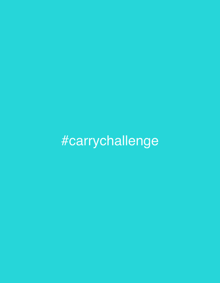 The image displays a minimalist digital graphic featuring a solid turquoise (cyan) background. Centered on this vibrant backdrop is white text that reads "#carrychallenge," rendered in a clear, sans-serif typeface. No subjects, objects, or a distinct scene are depicted beyond the colored background and the textual overlay. The primary activity indicated is participation in a social media challenge or campaign, as suggested by the hashtag. There are no visual cues for time of day, weather, or specific locations within the image itself. However, the context provided associates this media file with West Hollywood, United States of America, implying its origin or relevance to that area. The overall tone is neutral and direct, designed to convey the challenge's title.