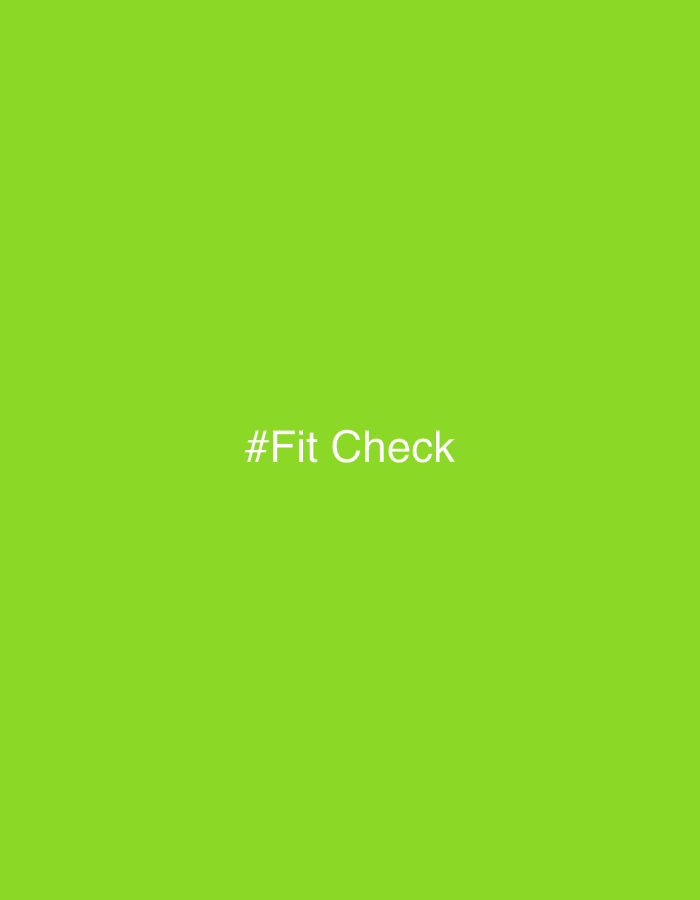 The image displays a solid, vibrant, bright green background. Centrally placed on this monochromatic canvas is the text "#Fit Check" rendered in a light grey or white sans-serif font. There are no visible people, objects, or discernible scenes beyond the background color and text.
No specific activity or event is taking place; the image is static and text-based. Notable details include the uniform color of the background, which fills the entire frame. There are no visual cues regarding the time of day, weather, or any specific emotions conveyed by subjects. The image lacks any geographical identifiers or landmarks that would connect it to the given location context of Chaikovsky, Russia, appearing as a generic digital graphic. The only visible text is "#Fit Check."