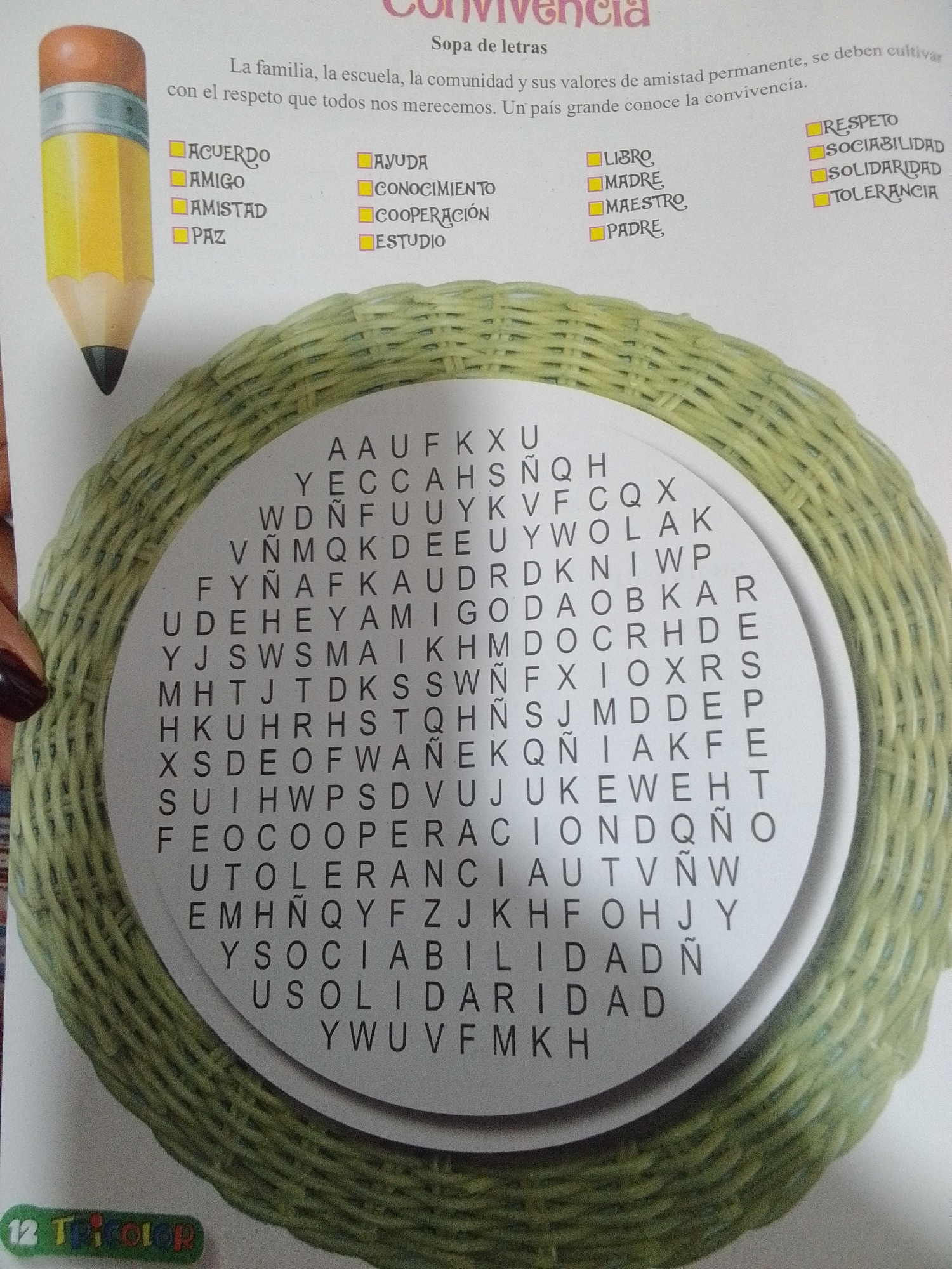 The image shows a close-up of a page from a book or magazine. The text "CONVIVENCIA" is at the top, with the subtitle "Sopa de letras" below. A paragraph of text follows, discussing family, school, values, and permanent friendship. To the left, a yellow pencil is depicted. Below the text and the pencil is a circular word search puzzle, woven into a basket-like design. The puzzle contains a grid of letters. To the right of the pencil, there are lists of words, some with checkboxes, such as "ACUERDO", "AMIGO", "AMISTAD", "PAZ", "AYUDA", "CONOCIMIENTO", "COOPERACIÓN", "ESTUDIO", "LIBRO", "MADRE", "MAESTRO", "PADRE", "RESPETO", "SOCIABILIDAD", "SOLIDARIDAD", and "TOLERANCIA". The bottom left corner of the image has a logo that reads "12 Tricolor". There is no indication of the city of La Tagua, Venezuela in the image.