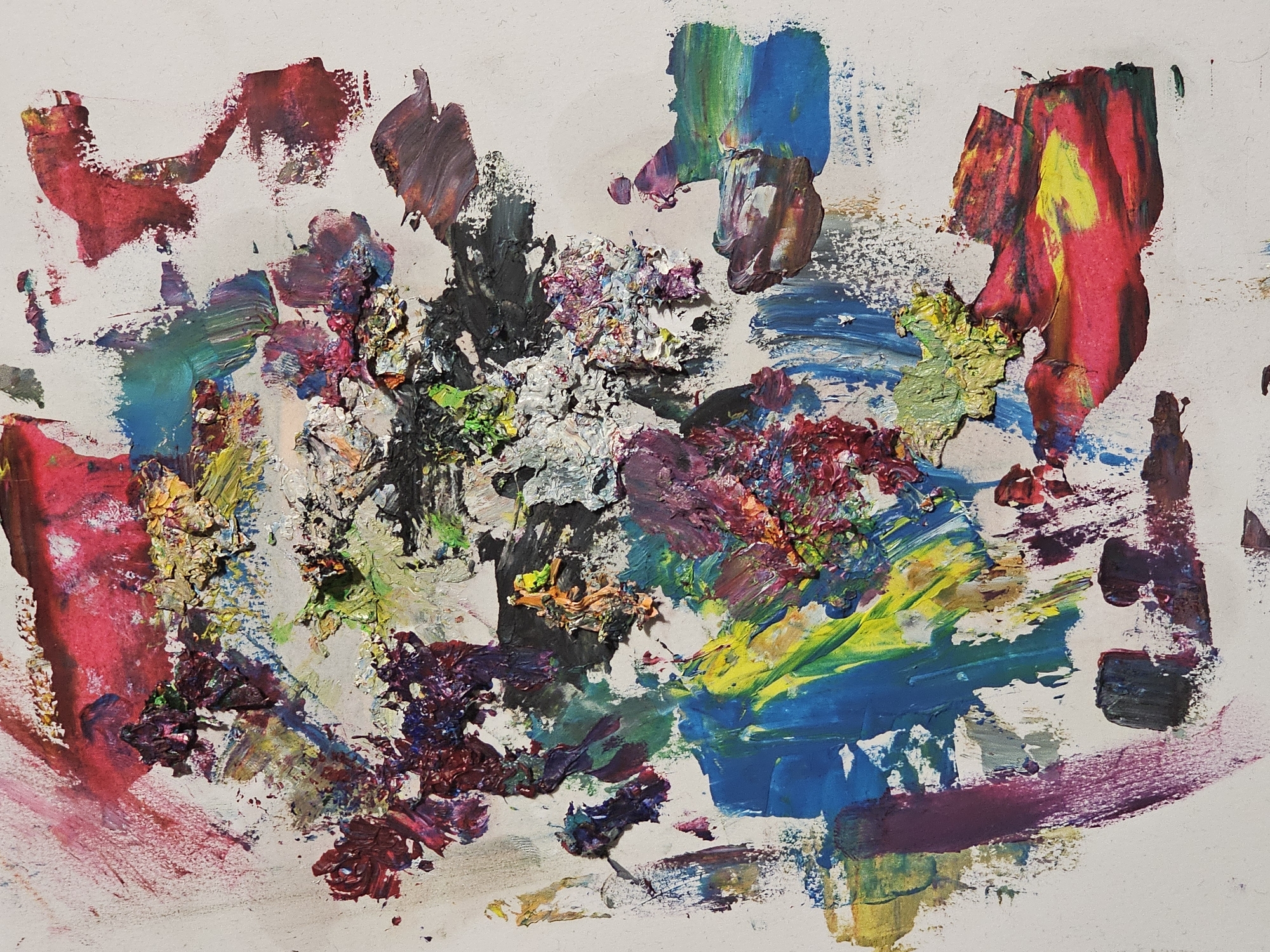 The image is an abstract painting on a white background. It contains various colors of paint, including red, blue, yellow, green, purple, and black, applied in thick strokes and splotches. The paint appears to be layered and textured, with some areas more densely covered than others. There are no recognizable figures, objects, or actions depicted. The painting does not depict any specific location in Plovdiv, Bulgaria.