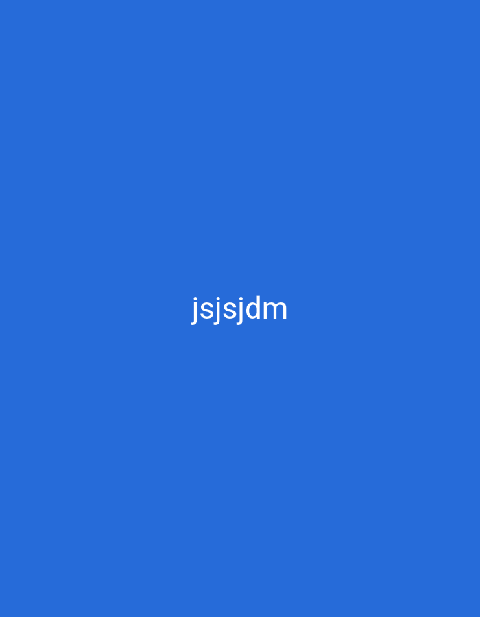The image is a plain blue background with the text "jsjsjdm" centered horizontally and located towards the top of the frame. The text is in a white, sans-serif font. There is no discernible environment or location in Nsugpe, Nigeria, as the image is solely composed of the blue background and text. There are no people, subjects, objects, actions, or interactions depicted.
