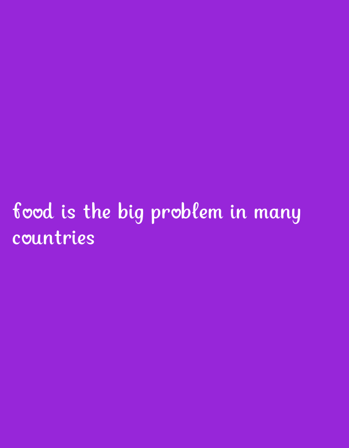 A purple background displays white text that reads, "food is the big problem in many countries." The text is in a stylized, cursive font with small heart shapes adorning the "o" in "food," "problem," and "countries." The overall image is simple, with no other objects or subjects present. The location is unknown.