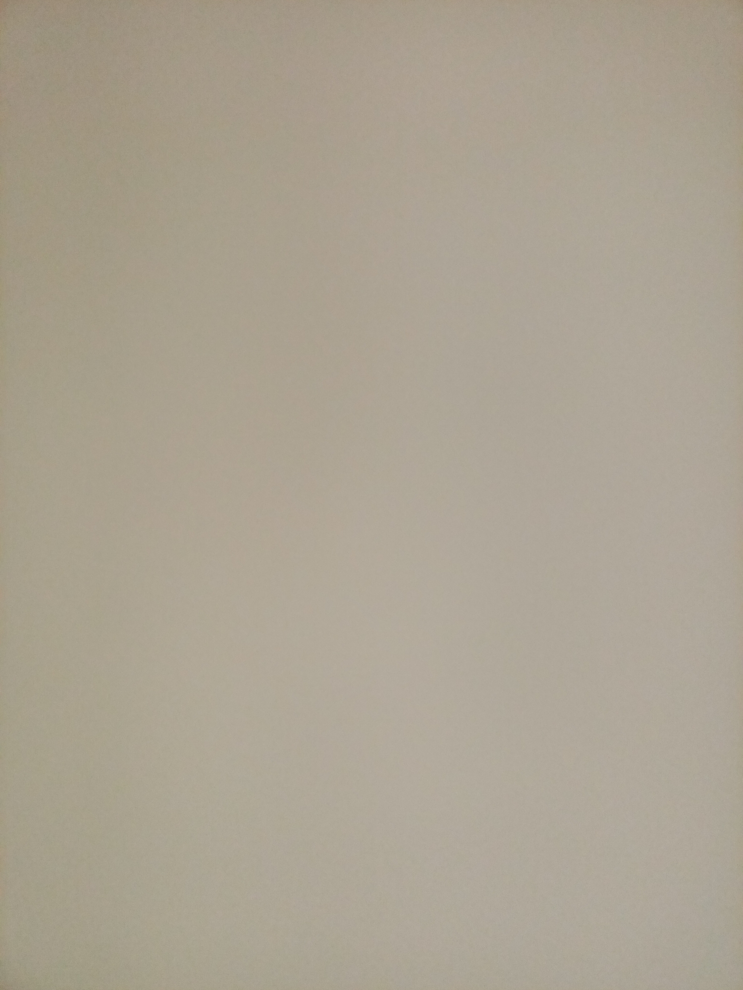 The image is a plain, light beige textured background with no discernible subjects, objects, actions, or interactions. It is not possible to determine the location within Rostov-on-Don, Russia, as there are no identifiable landmarks or context. The image appears to be a close-up of a textured surface, possibly a wall or fabric.
