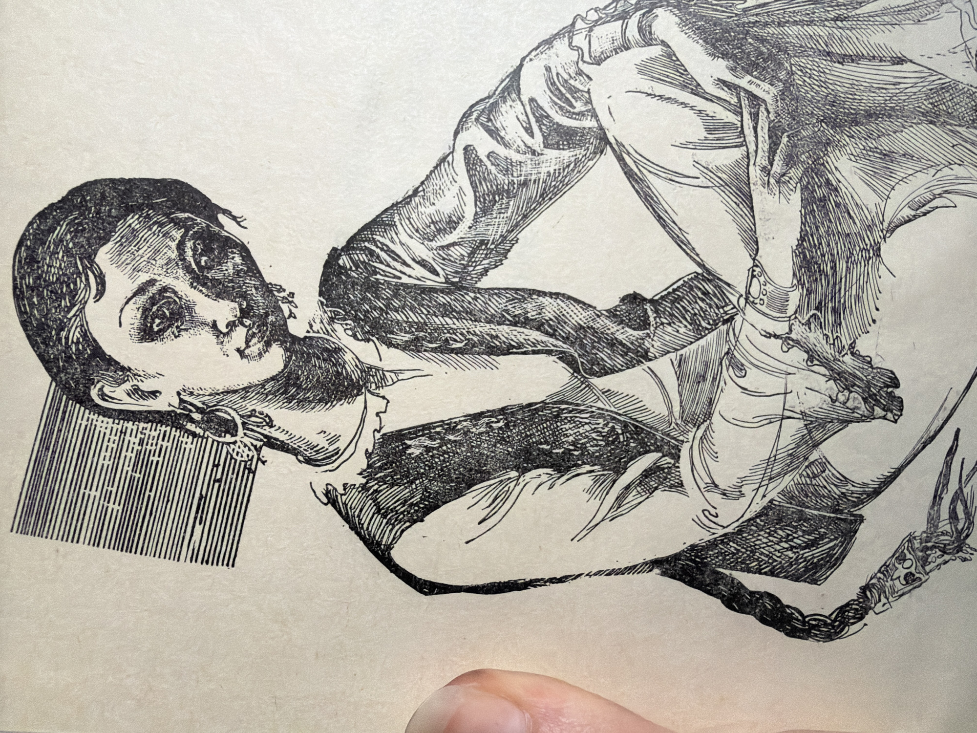 The image is a black and white ink drawing of a young woman sitting cross-legged. She has her hair styled in a braid that hangs over her shoulder, and she is wearing a vest over a long-sleeved shirt. The drawing is detailed, with fine lines used to create shading and texture. The woman's facial expression is somewhat melancholic, with her head tilted slightly. There is a square, patterned shape behind her head, possibly indicating a window or a decorative element. The bottom right corner of the image shows a hand, possibly the artist's, holding the edge of the paper.
There is no information in the image or any provided context that links it to the city of Malyshevo, Russia.