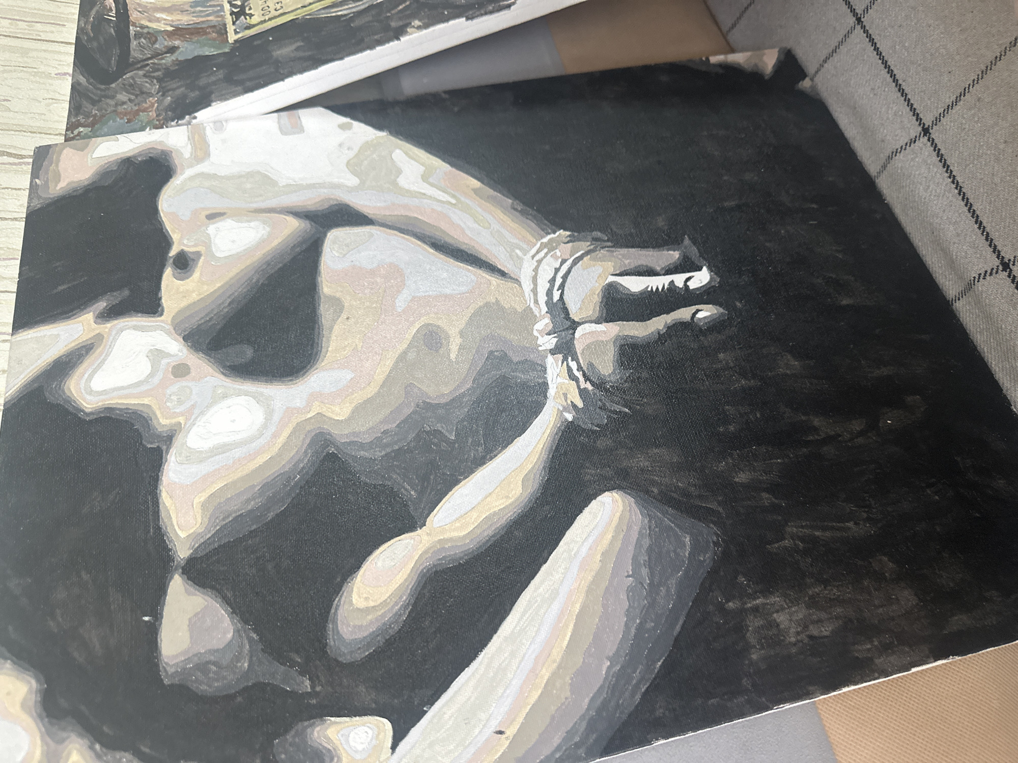 The image shows a monochromatic painting depicting a nude figure with bound hands against a dark background. The figure appears to be in a reclining or seated position. The style utilizes tonal gradations to define form and volume. The location mentioned (Высокий, Russia) is unrelated to the image content.