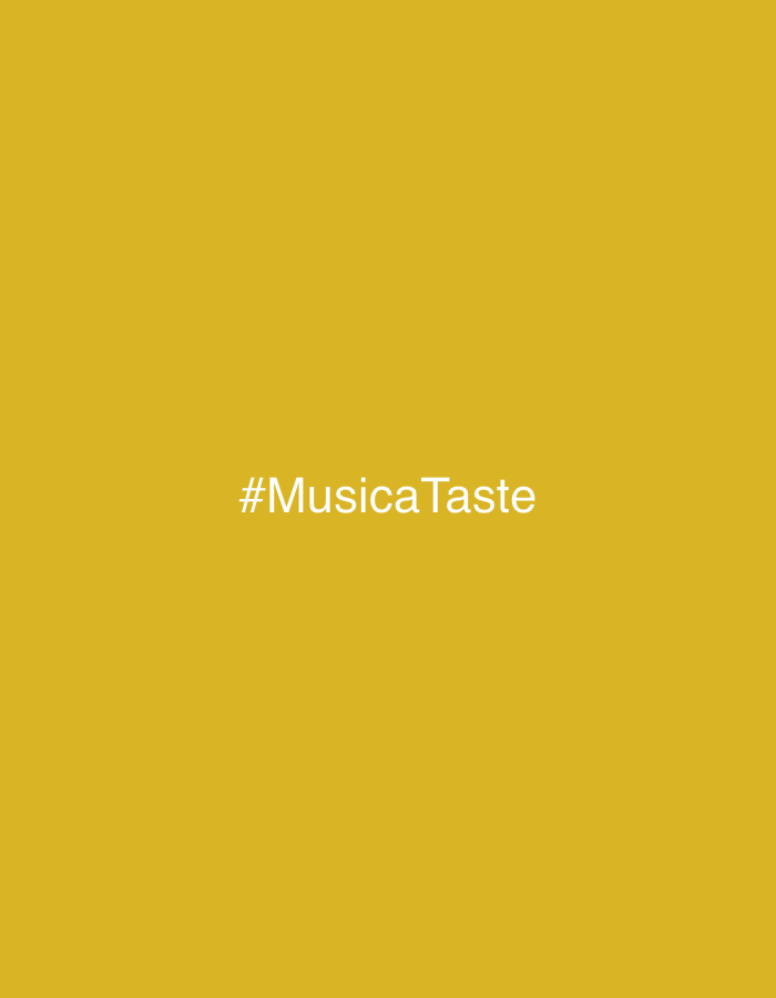 This media file is a static image with a solid, dark yellow background. Centered on the image is the text "#MusicaTaste" in a white, sans-serif font. The text is capitalized, with "M" in "Musica" and "T" in "Taste" also capitalized. There are no discernible subjects, objects, scene, or setting beyond the plain background and text. The image does not depict any activity or event, nor does it provide any clues about the time of day, weather, or location. The emotion conveyed is neutral due to the lack of visual elements. The only visible text is the hashtag "#MusicaTaste".