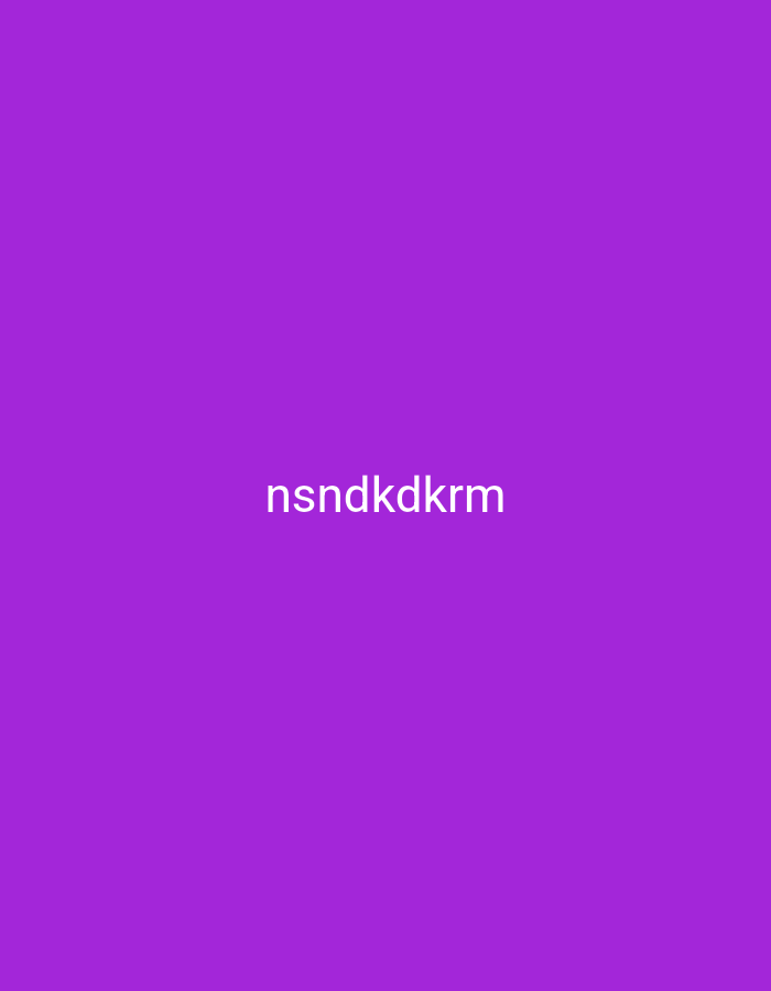 The image is a plain purple background with the text "nsndkdkrm" centered horizontally and vertically. There are no people, subjects, objects, or actions visible in the image. There is no information about the location in the city of Nsugpe, Nigeria, that can be derived from the image.