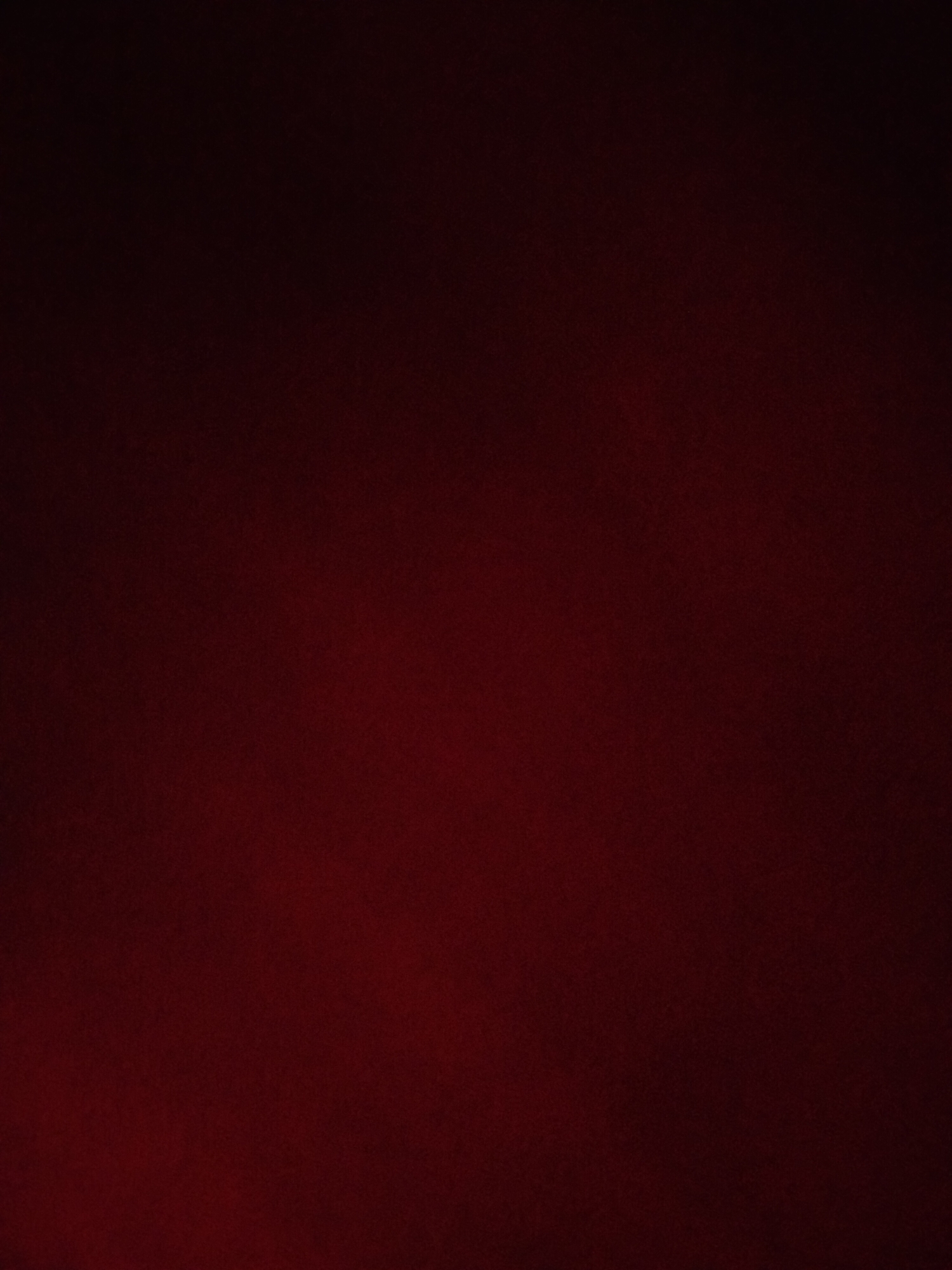The image is a dark, blurry, solid color of maroon. It does not contain any recognizable objects, people, or locations, including Yerevan, Armenia.