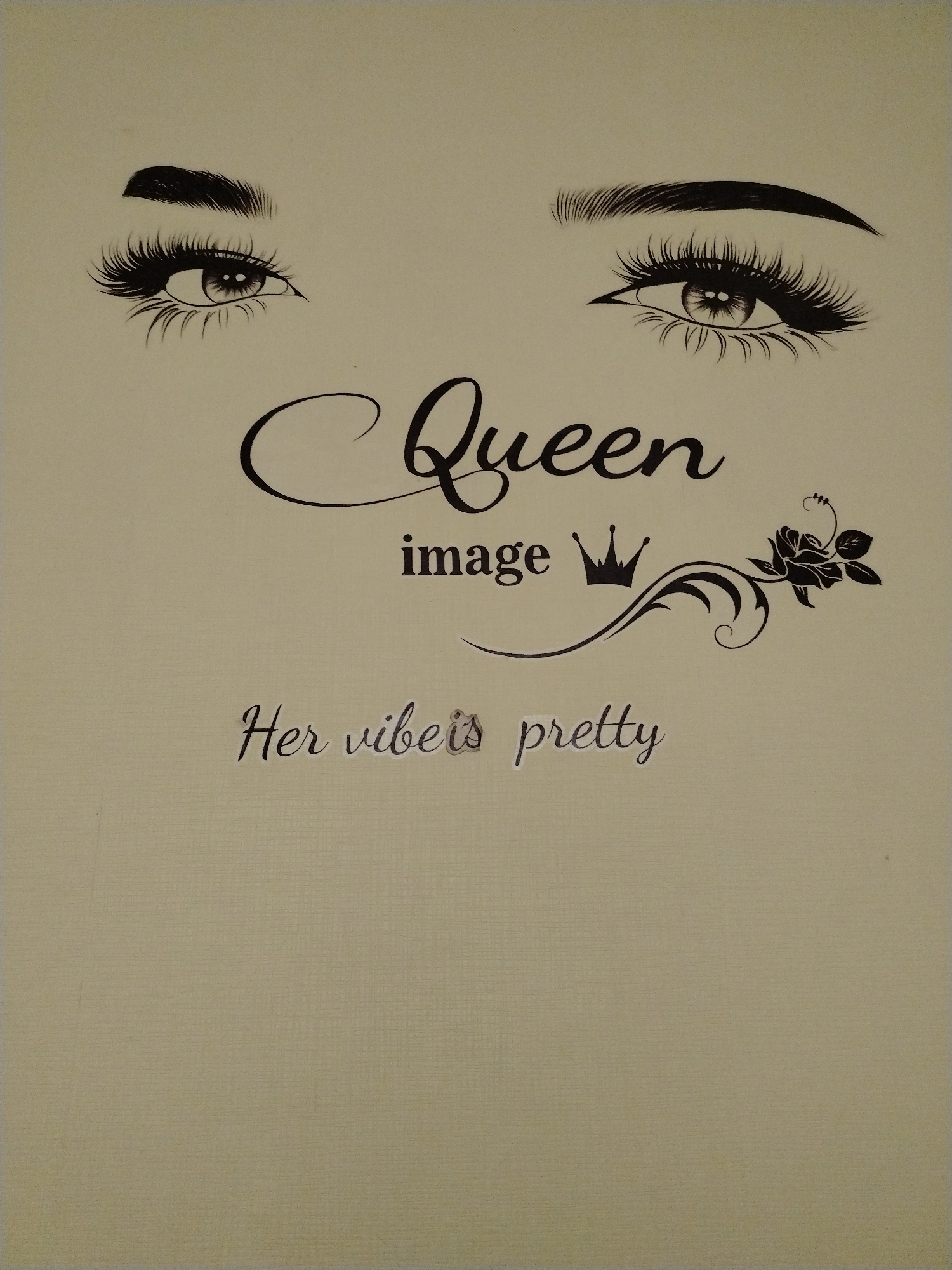 The image is a close-up of a light tan, textured surface, likely a piece of paper or cardstock. It features a graphic design with black lettering and illustrations. Dominating the top of the image are two stylized eyes with long, prominent eyelashes and arched eyebrows. Below the eyes, the word "Queen" is written in a large, elegant script font. Beneath "Queen," the word "image" is printed in a smaller, simpler font, accompanied by a small crown icon. To the right of "image" and the crown, there is a decorative flourish ending in a black silhouette of a rose with leaves and a curling vine. At the bottom of the graphic design, the phrase "Her vibes is pretty" is written in a script font, with a small, lighter colored embellishment on the word "vibes." The overall impression is of a design meant for beauty products, fashion, or a motivational quote. There are no elements in the image that suggest a location in Taraz city administration, Kazakhstan or any urban environment.