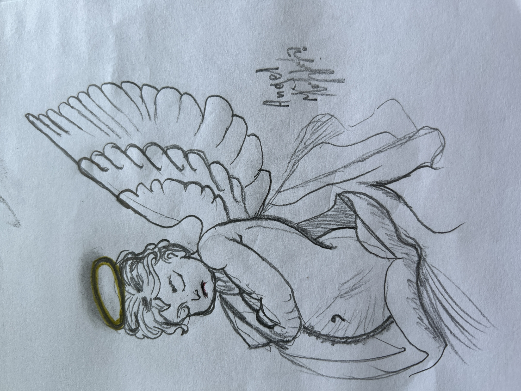 A sketch on white paper depicts a cherubic figure with closed eyes and crossed arms, a prominent belly, and large wings. A yellow halo encircles its head. The figure is draped in fabric. To the right of the figure, a signature reads "Angel Motha". The sketch is rendered in pencil, with some areas appearing smudged. The background is plain white paper.