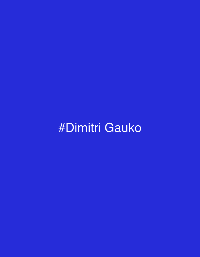 This media file is a solid blue background with white text displayed in the center. The text reads "#Dimitri Gauko". There are no discernible subjects, objects, scene, or setting beyond the text and the background. No activity or event is taking place. There are no notable details regarding time of day, weather, location cues, or emotions, as the image is purely graphic.
