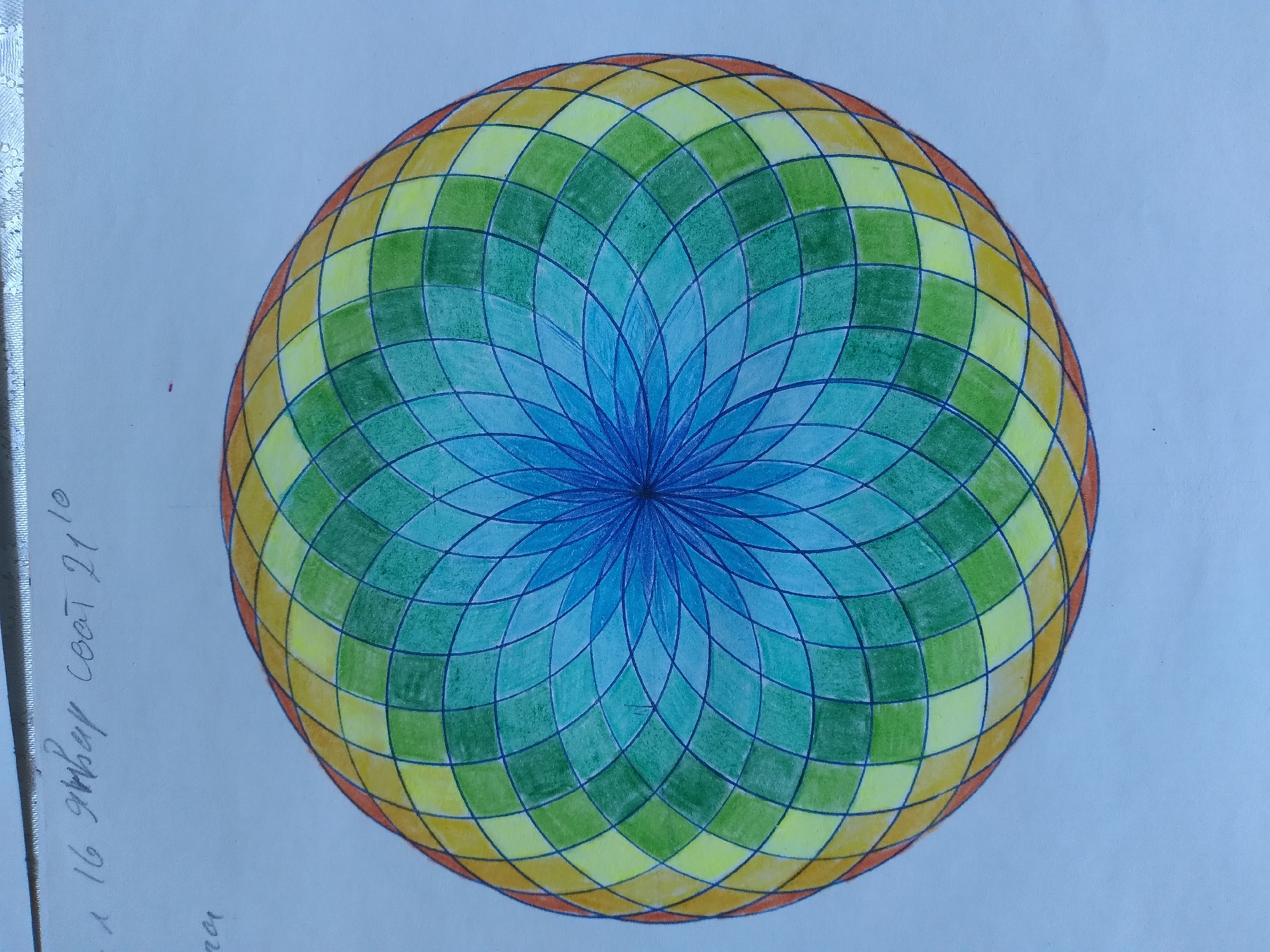 A hand-drawn mandala-like design is centered on a white piece of paper. The design is circular and features a radial pattern of colored segments. The colors start with dark blue in the center and transition through shades of turquoise, green, yellow, and orange towards the outer edge. The drawing is done with colored pencils. In the top left corner of the paper, there is handwritten text in what appears to be Cyrillic script, with the visible portion reading "16 января 2021" which translates to "January 16, 2021". There is no indication of the city of Baki, Uzbekistan, or any other geographical location in the image. The image is a close-up shot of the artwork.