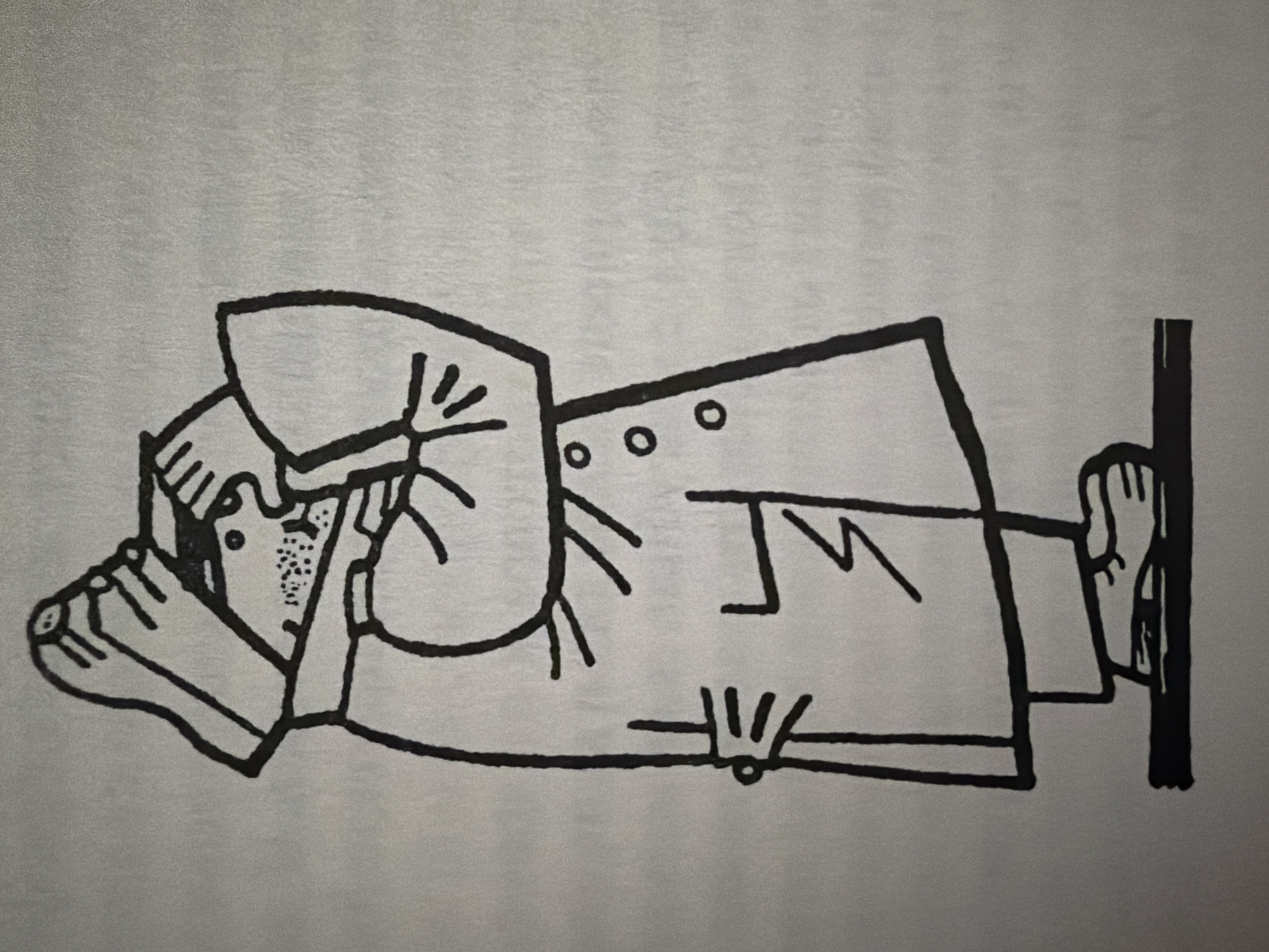 The image is a black and white line drawing of a cartoonish figure standing on a dark platform. The figure is wearing a long coat with three circular buttons down the front. The figure has its arms raised, holding what appears to be a hat over its head. The figure's face is partially obscured, but it has dotted shading on the cheeks and a small eye. The figure is wearing shoes. The background is a plain, textured gray. There is no identifiable location in the city of Pazardzhik, Bulgaria, depicted or suggested by the image.