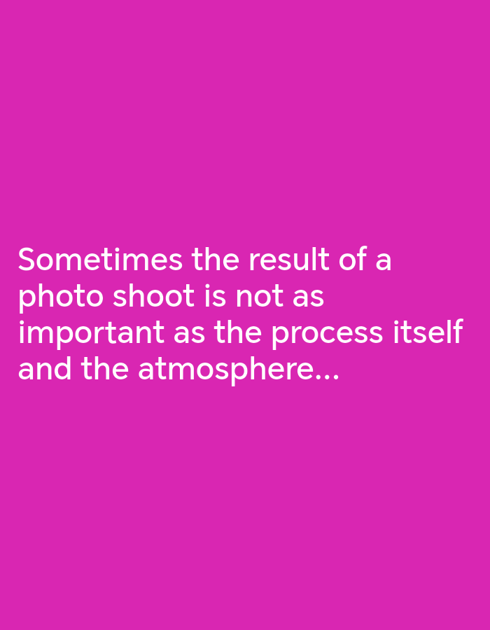 The image shows white text on a solid pink background. The text reads, "Sometimes the result of a photo shoot is not as important as the process itself and the atmosphere..." There are no other objects, people, or subjects visible in the image. The environment is defined solely by the background color. The location in the city of Chaikovsky, Russia is not visible and therefore cannot be described.
