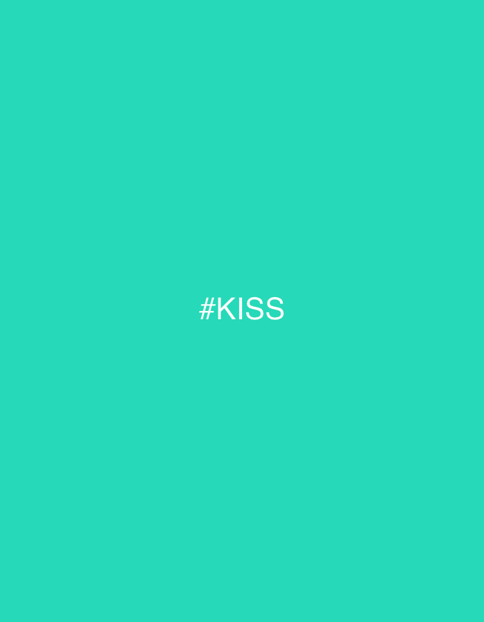 The image is a solid teal color with the text "#KISS" in white at the center. There are no details about a city, people, objects, actions, or environment.
