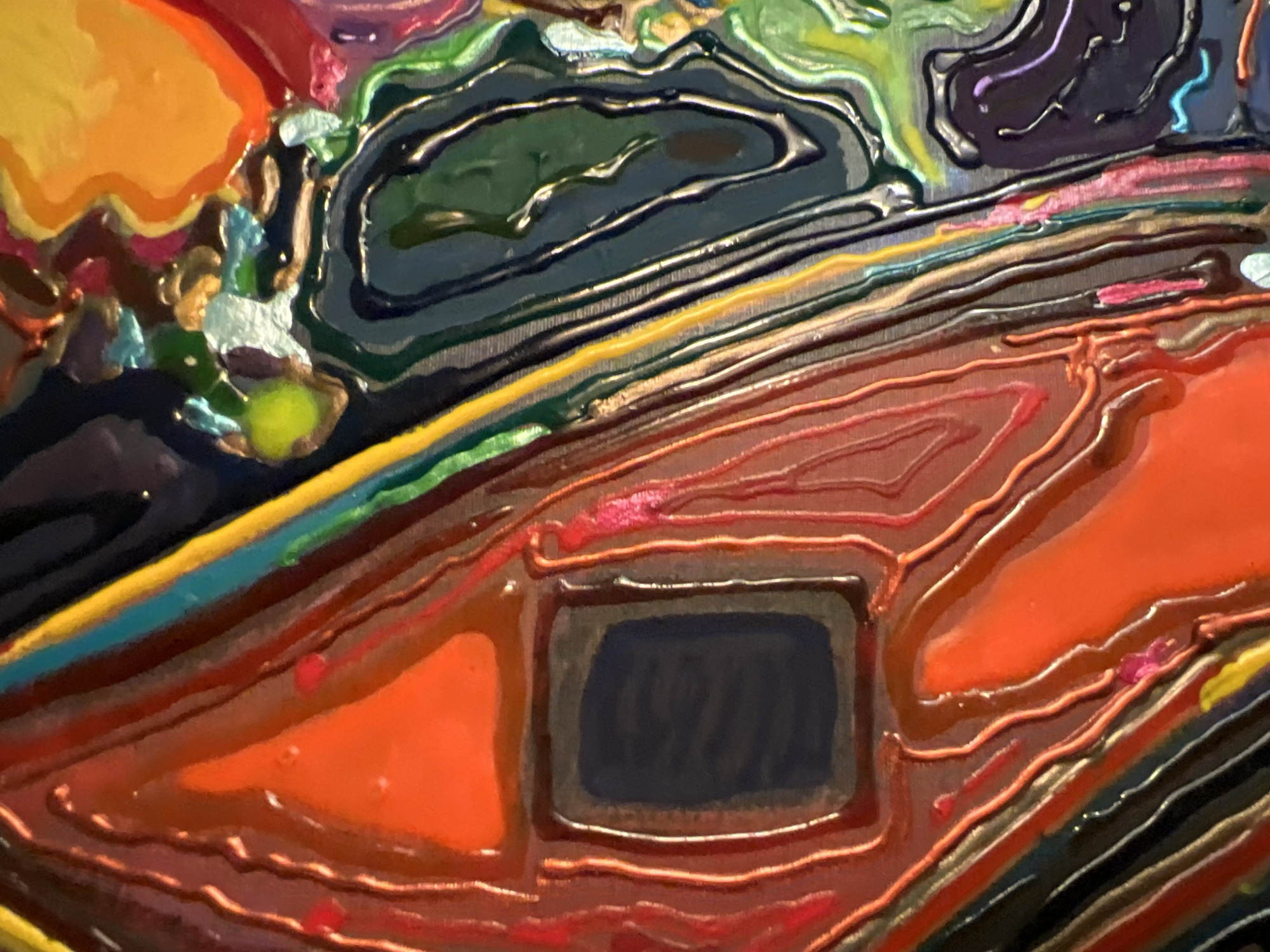 This image is a close-up photograph of an abstract painting, focusing on textures and colors rather than a discernible scene. The painting features a variety of vibrant hues including orange, red, yellow, green, blue, and purple, applied in thick, textured strokes that create a sense of depth and movement. Swirls and lines of paint are visible, some appearing glossy and others matte. There are no people or recognizable objects from the city of Minsk, Belarus, present in the image. The focus is entirely on the artistic medium and its abstract qualities.
