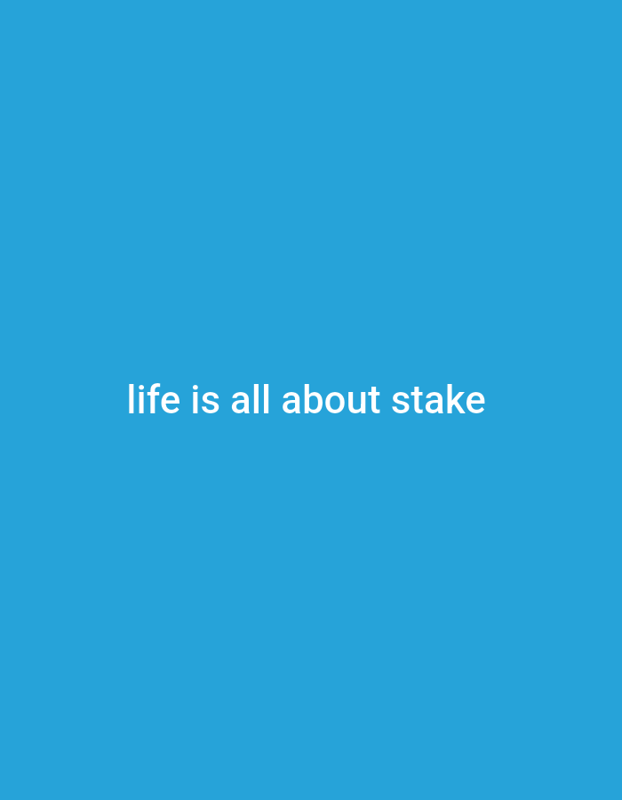 A plain, solid blue background fills the entirety of the image, with no discernible features or objects present. Centered within the image, and rendered in white text, is the phrase "life is all about stake." There is no information available about the location of this image, nor is there any context provided.
