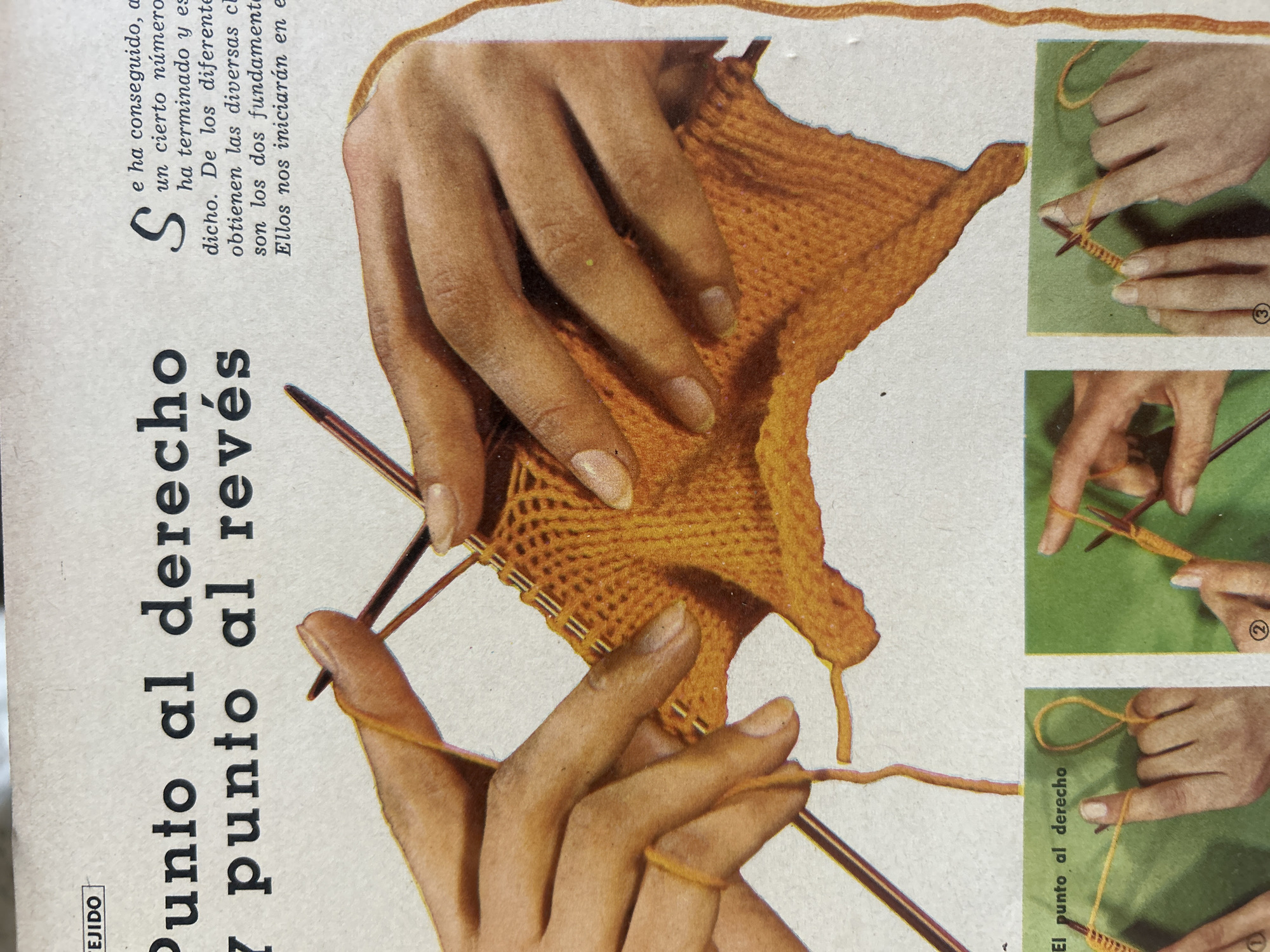 The image is a close-up, overhead view of a person's hands knitting with orange yarn and two knitting needles. The yarn is being worked into a piece of orange fabric, with several rows of stitches visible. The hands appear to be of a light-skinned individual, and the fingers are interlaced with the yarn and needles in the process of creating knit stitches. The background is a light-colored, textured surface, possibly paper, with some text printed on it. In the lower portion of the image, there are three smaller inset photographs, each showing a hand demonstrating a specific knitting technique, also with orange yarn and knitting needles. These inset images are bordered in green and feature numbered circles (1, 2, and 3) below each illustration, suggesting a step-by-step guide. The overall presentation suggests a page from a craft or hobby magazine. There is no visible indication of the city of Santa Ana, Venezuela, within the image content.