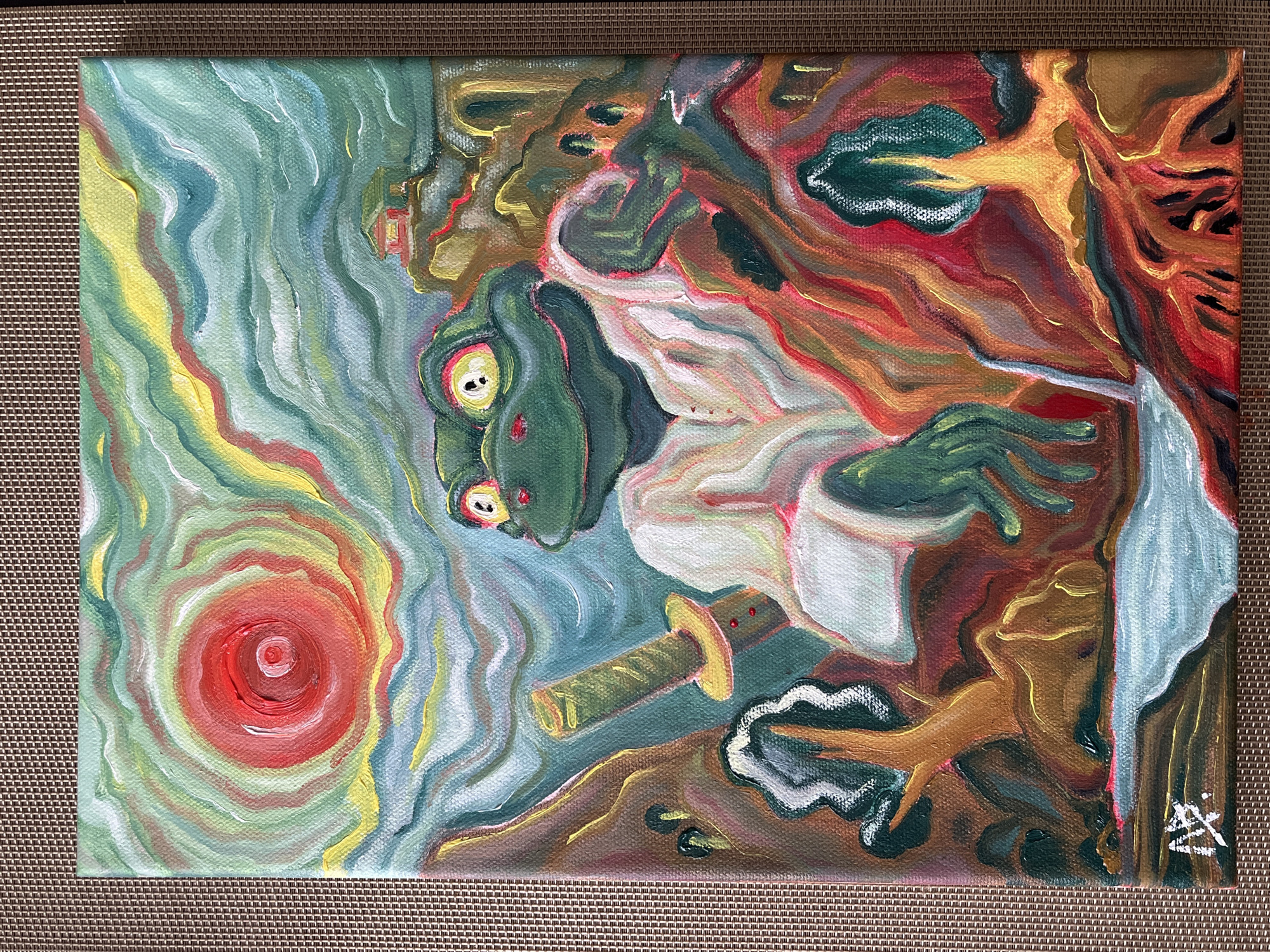 The image is a painting on canvas depicting a stylized, cartoonish samurai frog wielding a katana. The frog is green with bulging yellow eyes and is wearing a white robe. It is positioned diagonally across the canvas. To the frog's left is a swirling background of light blue, green, and yellow colors with a red circular shape resembling a sunset or vortex. To the frog's right are swirling patterns of brown, orange, and red hues that suggest an abstract landscape. The painting features a visible signature in the bottom right corner composed of white lines and shapes. The canvas is resting on a woven brown surface.