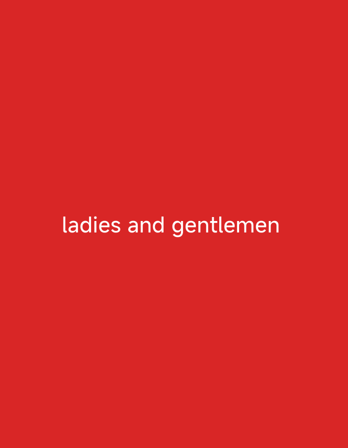 The image is a still from a video with a red background. White text reads "ladies and gentlemen" centered on the screen. The text is clear and legible. There are no other discernible subjects, objects, or scene elements. The image does not provide any information about the time of day, weather, location cues, or emotions. The context provided states the location is Tabari Jauro Manu, Nigeria, but this information is not visually present in the image itself.