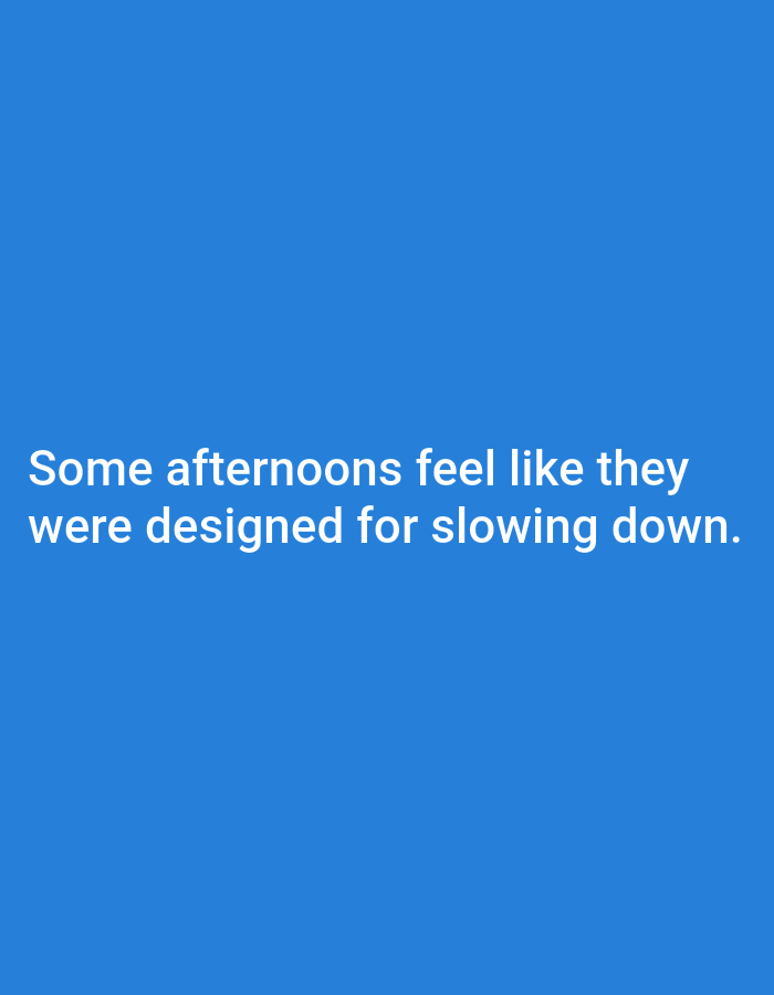 The image is a simple blue background with white text. The text reads: "Some afternoons feel like they were designed for slowing down." There is no discernible location in Tebuwung, Indonesia, as the image is purely text-based and lacks any geographical or environmental context.