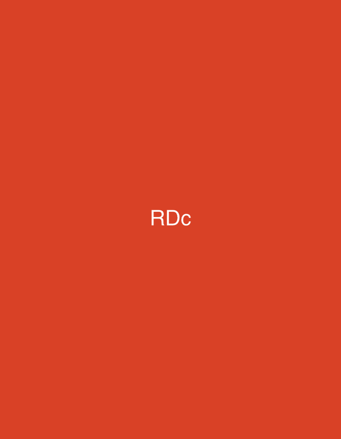 The image displays a solid, uniform red-orange background. Centered both horizontally and vertically on this background is the white text "RDc" rendered in a sans-serif typeface. There are no people, discernible objects beyond the text, or environmental details present that would indicate a physical location, including the city of Casablanca, Morocco. The scene is purely graphical and abstract, devoid of any actions or interactions.