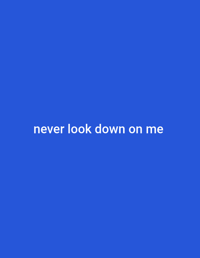 The image displays a solid, uniform royal blue background. Centered horizontally on this background is white sans-serif text that reads "never look down on me". The image contains no visual representation of people, subjects, objects, actions, or interactions. The environment is purely abstract, consisting solely of the colored background and text. No geographical indicators or contextual elements are present to suggest a specific location, including the city of Jalingo, Nigeria.