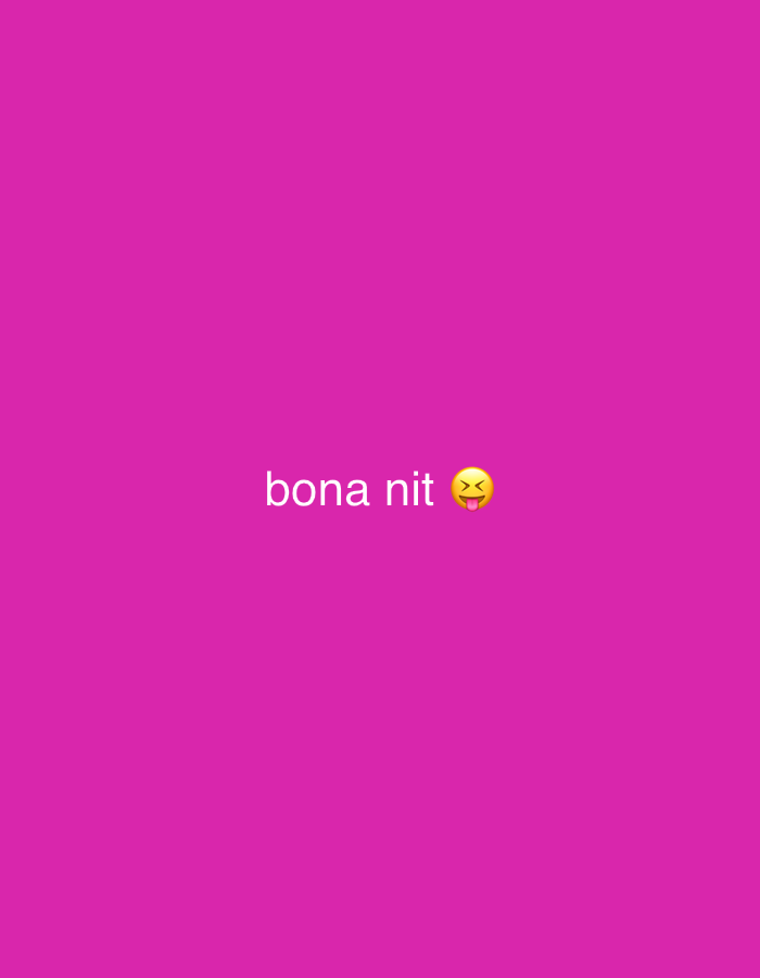 The image displays the text "bona nit" followed by a playful emoji with a tongue sticking out and eyes squinted. The text is white and centered on a solid pink background. There are no other objects, subjects, or environmental elements visible in the image. There is no discernible location in Mollet Del Vallès, Spain.