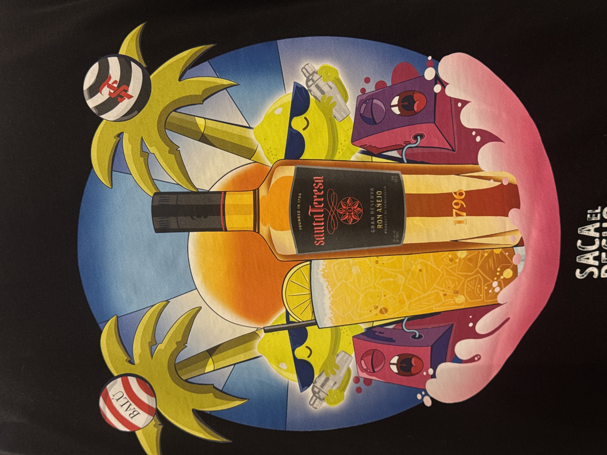 The image is a graphic design on a black background, featuring a central illustration within a light blue circle. The core element is a bottle of Santa Teresa 1796 Ron Anejo, placed horizontally. Flanking the bottle are two cartoon lemons wearing sunglasses; one holds a cocktail shaker. Two stylized, pink cube-shaped characters with exaggerated facial expressions appear on either side of the bottle.
Two palm trees with cartoon-like foliage frame the scene. The treetop on the left is a striped sphere with a logo, while the treetop on the right is a striped sphere labeled "BALÚ". A pink, stylized wave crashes around the right side of the scene.
The text "SACA EL" is visible on the right side, oriented vertically and partially cut off by the edge of the image. The text on the rum bottle is legible and reads "FOUNDED IN 1796", "santa Teresa", "GRAN RESERVA RON ANEJO", and "PRODUCT OF VENEZUELA", along with "1796." The location Pampatar, Venezuela is not included in the image.