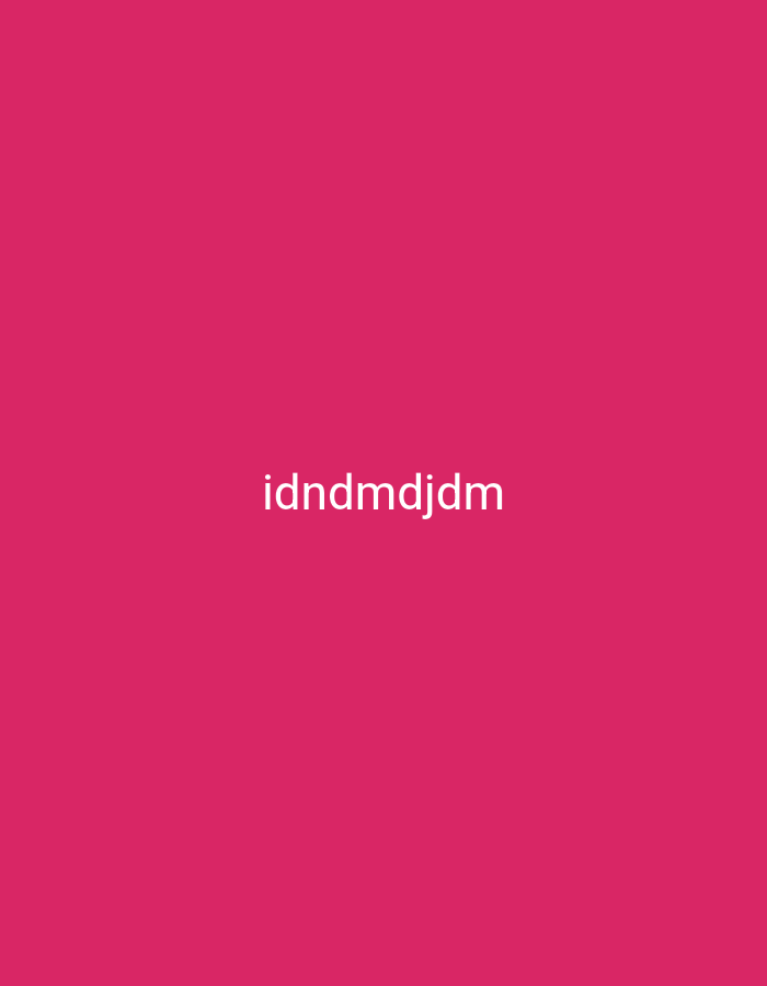The image is a solid bright pink background with the text "idndmdjdm" in white, centered horizontally and positioned in the lower half of the frame. There are no other objects, people, or details visible in the image. It is not possible to determine the location in the city of Nsugpe, Nigeria based on this image.