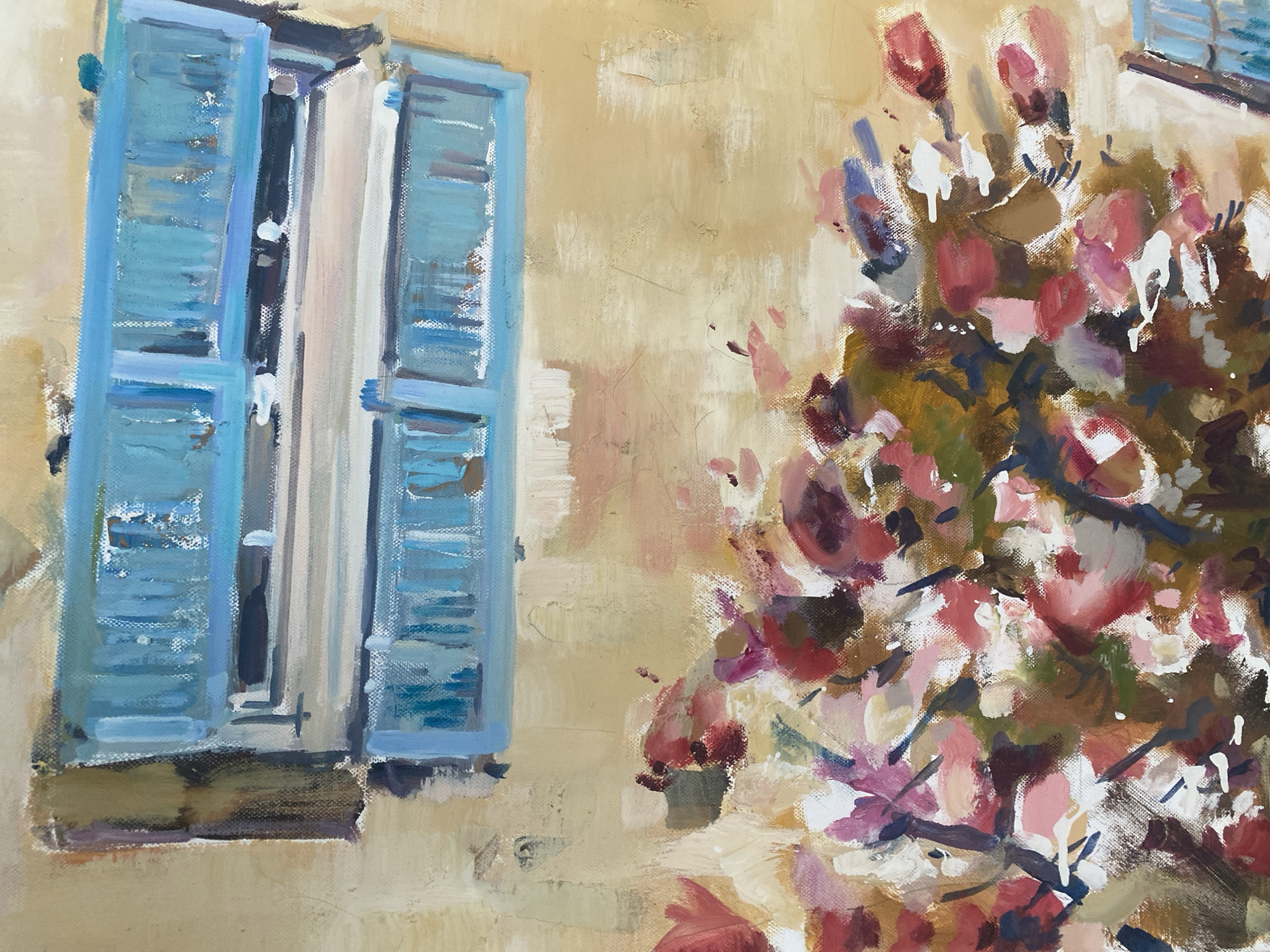This is an oil painting on canvas depicting an outdoor scene with a building facade and flowering branches. On the left side of the image, there is an open window with light blue shutters. The shutters are painted with visible brushstrokes, suggesting a weathered or textured surface. The window frame is white. The building's wall is painted in a warm, light yellow or beige color, with some areas of lighter white and pinkish tones, possibly indicating plaster or weathered paint.
To the right of the window and occupying the right half of the canvas, are branches of a flowering plant. The flowers are rendered in various shades of pink, red, and white, with some darker, almost maroon or burgundy, tones. The foliage is depicted with a mix of greens and browns. The painting style is impressionistic, with loose brushwork and a focus on capturing the light and color rather than precise detail.
The scene appears to be of a building in a Mediterranean or similar climate, where such architectural features and flowering plants are common. While the prompt mentions Sutomore, Montenegro, there are no specific visual cues within the painting itself (such as signage, distinctive landmarks, or local flora/fauna that are uniquely identifiable to Sutomore) to confirm this location. The image is a still life or a landscape with architectural elements, devoid of any human figures or discernible actions. The overall impression is one of a bright, sunlit day.