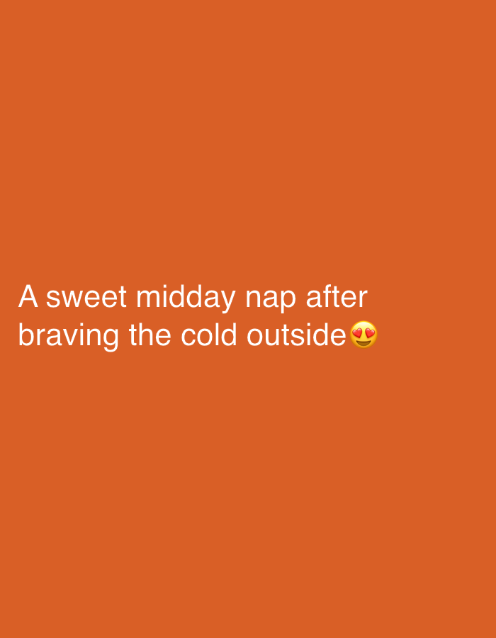 The image displays a solid orange background. White text is centrally positioned in the lower portion, reading "A sweet midday nap after braving the cold outside". An emoji, depicting a yellow smiling face with red heart eyes, follows the text. The visual content of this image does not depict any specific location within the city of Kyiv, Ukraine. No identifiable people, distinct subjects beyond the text and emoji, objects, actions, interactions, or a discernible physical environment are present.