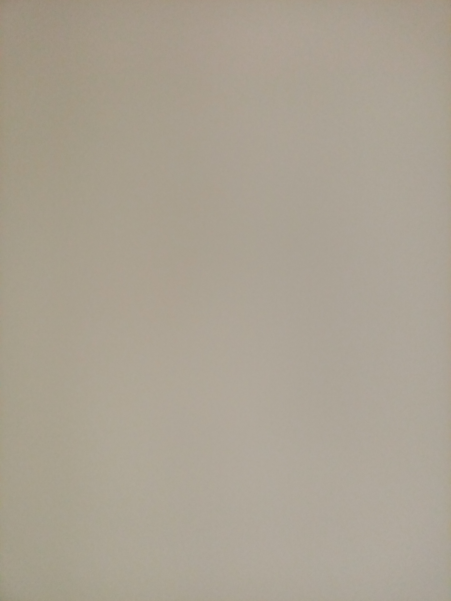 The image is a plain, textured, light beige background. There are no discernible subjects, objects, actions, interactions, or environmental details present. Therefore, it is impossible to determine any specific location, including in the city of Rostov-on-Don, Russia.