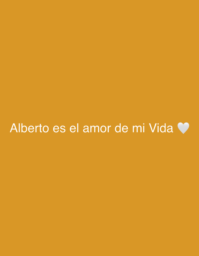 A white, sans-serif font spells out "Alberto es el amor de mi Vida" which translates to "Alberto is the love of my life" across the center of an orange-yellow background. To the right of the text is a white heart emoji. The image is a photograph of text on a solid color background and provides no information about Santa Ana, Venezuela.