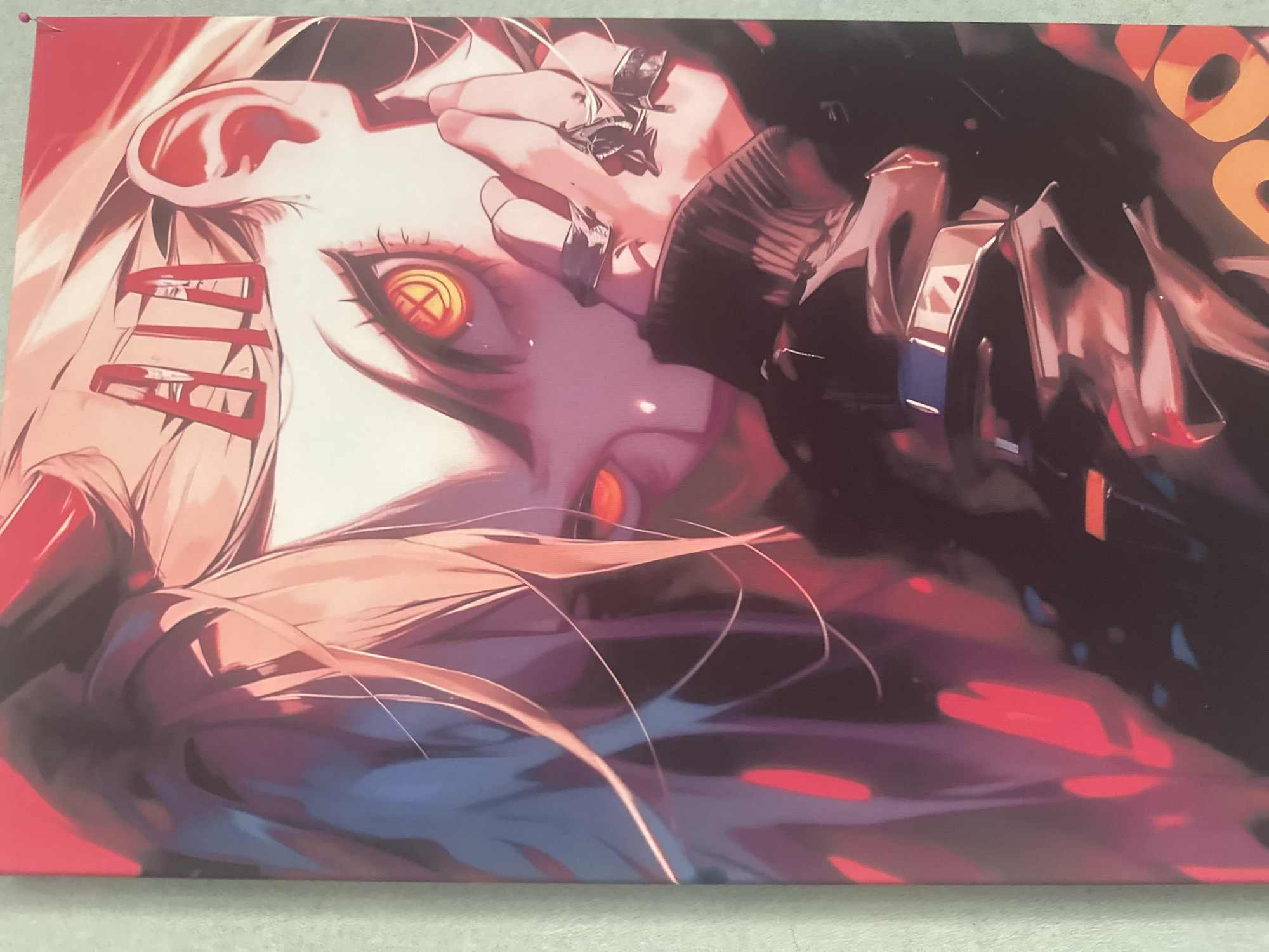 The image is a close-up, vertically oriented poster or canvas print featuring an anime-style depiction of a character with striking features. The character has bright, glowing orange eyes with a circular, cross-like pupil. Two red hair clips are positioned above their forehead. Their hair is long and blonde, with strands falling across their face. They are wearing dark clothing with a high collar, and several rings are visible on their fingers, which are brought up to their face, partially obscuring it. The art style is characterized by sharp lines, bold colors, and dramatic lighting, with strong reds, oranges, and purples dominating the palette. The background is abstract and dark, with splashes of red light. There are no discernible elements in the image that can be used to determine its location in Maladzyechna, Belarus, or any other geographical location.