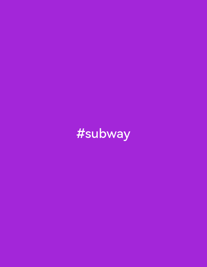 The image is a solid purple background with the white text "#subway" centered in the image. There are no people, subjects, objects, actions, or interactions visible in the image. The location is not discernible from the image.