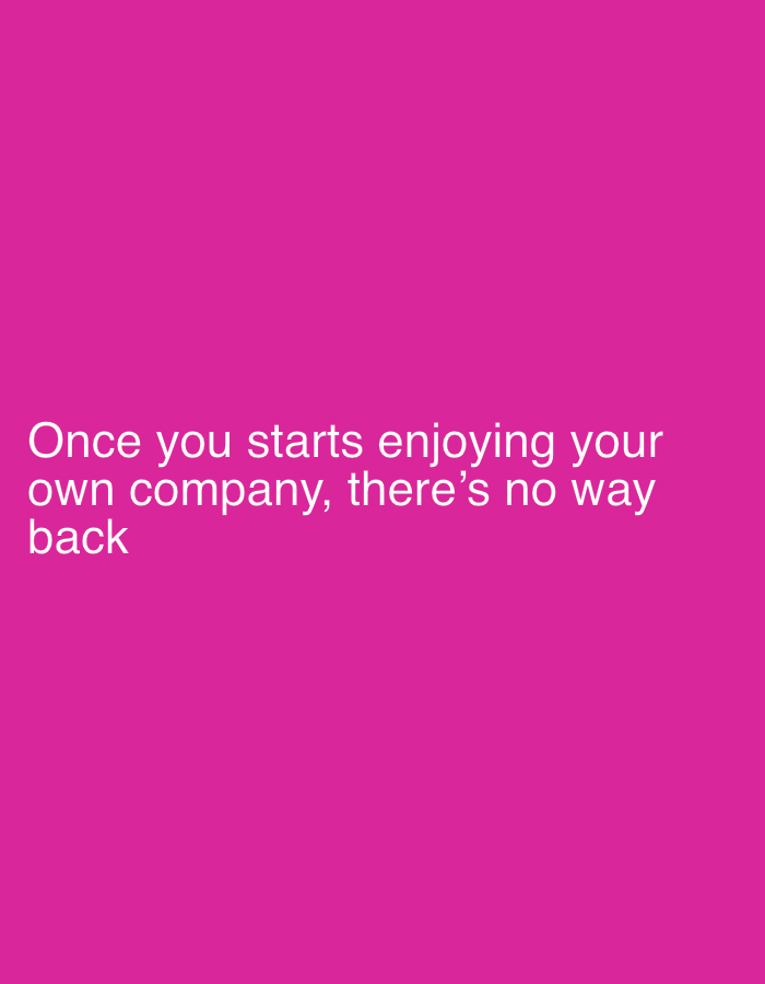 The image is a close-up of white text on a bright pink background. The text reads: "Once you starts enjoying your own company, there's no way back". There are no people, objects, or environmental details visible. The location of this image in Pazardzhik, Bulgaria is not determinable from the visual content.